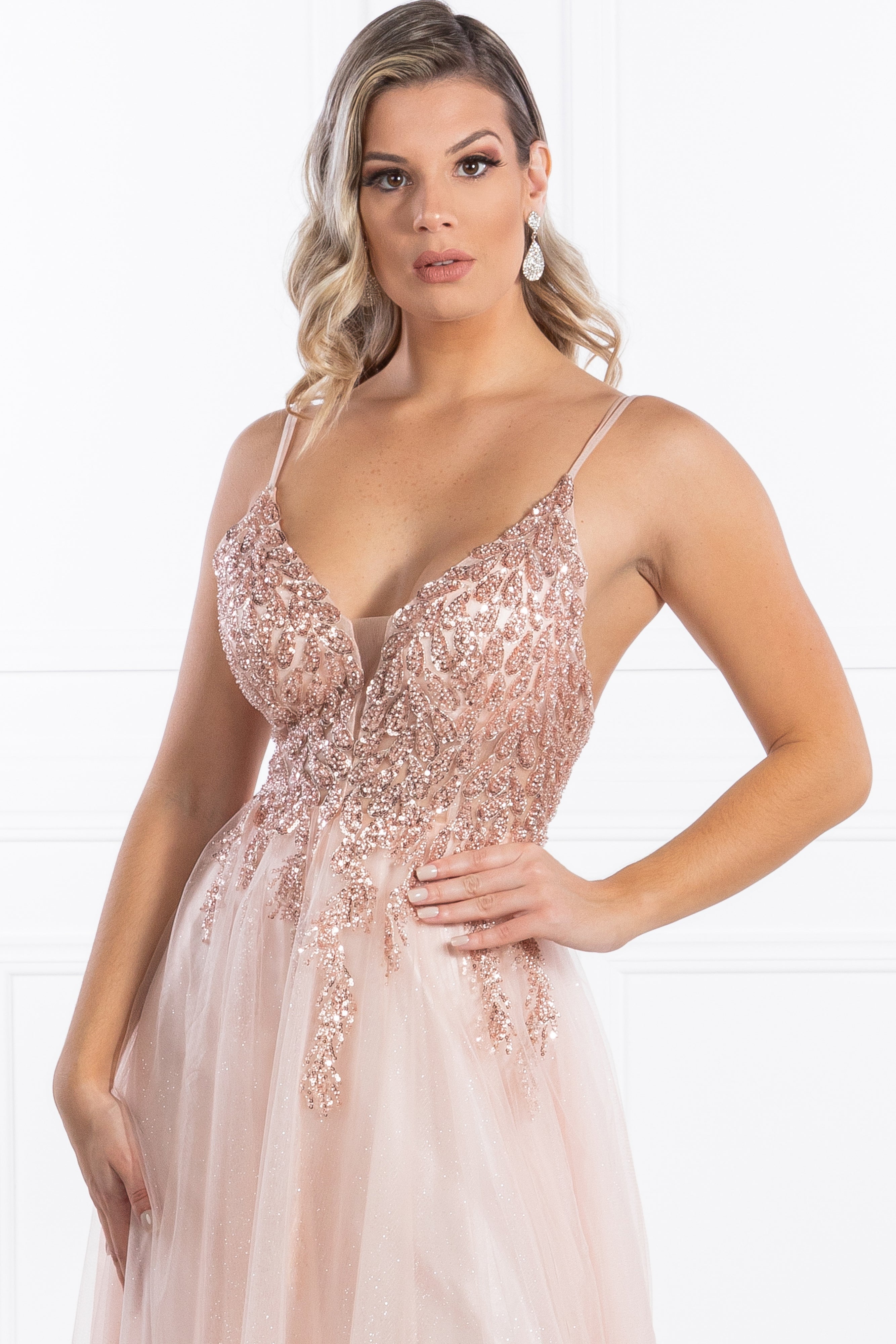Model wearing the Honey Couture EDEN Blush Crystal Beaded Tulle Formal Gown, Australian Designer Prom Dress with V neckline and thin straps. Affordable Evening Gown.