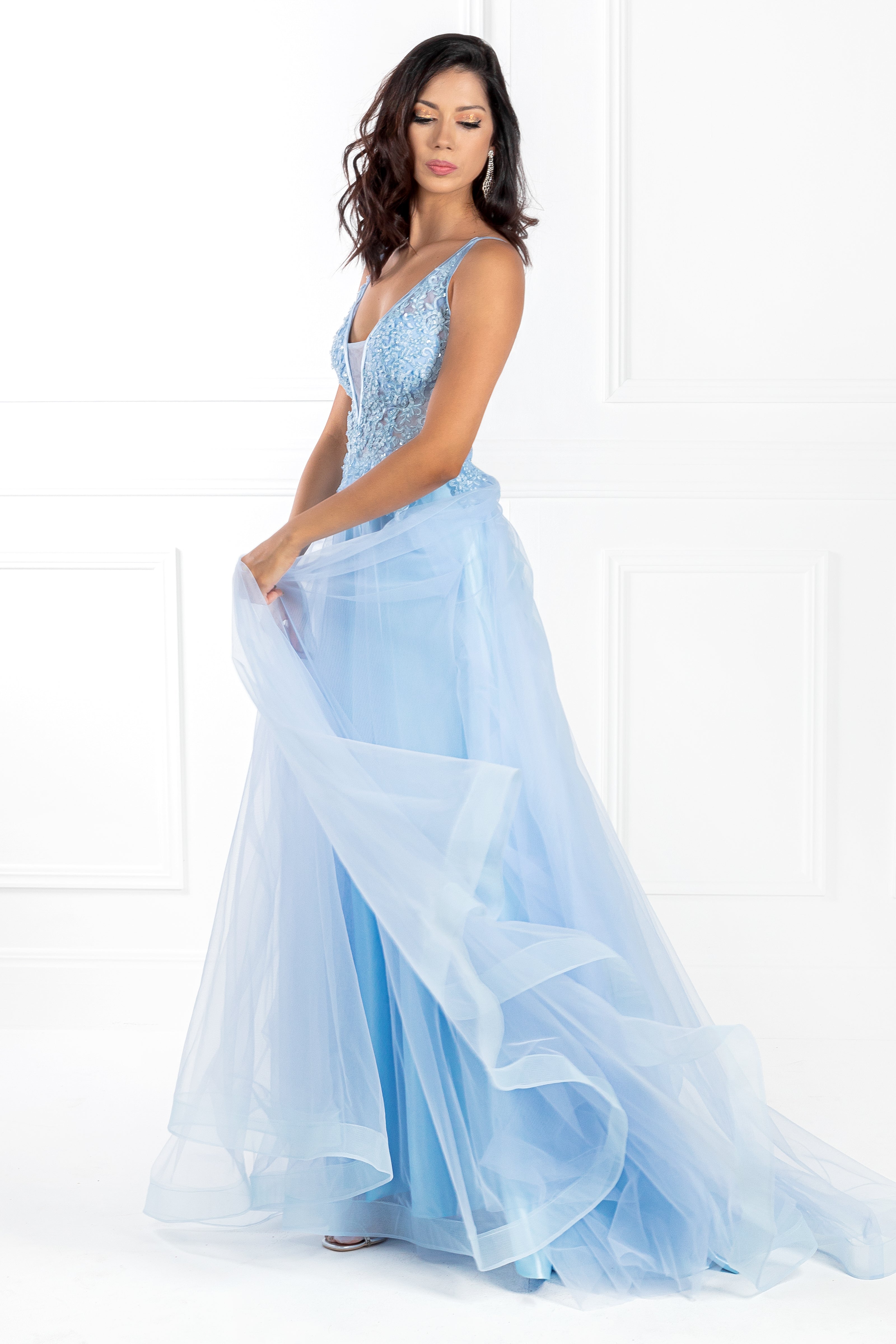Woman wearing Honey Couture BESS Beaded Lace Applique Formal Dress, evening gown by Australian designer with tulle skirt and deep plunge V-neck.