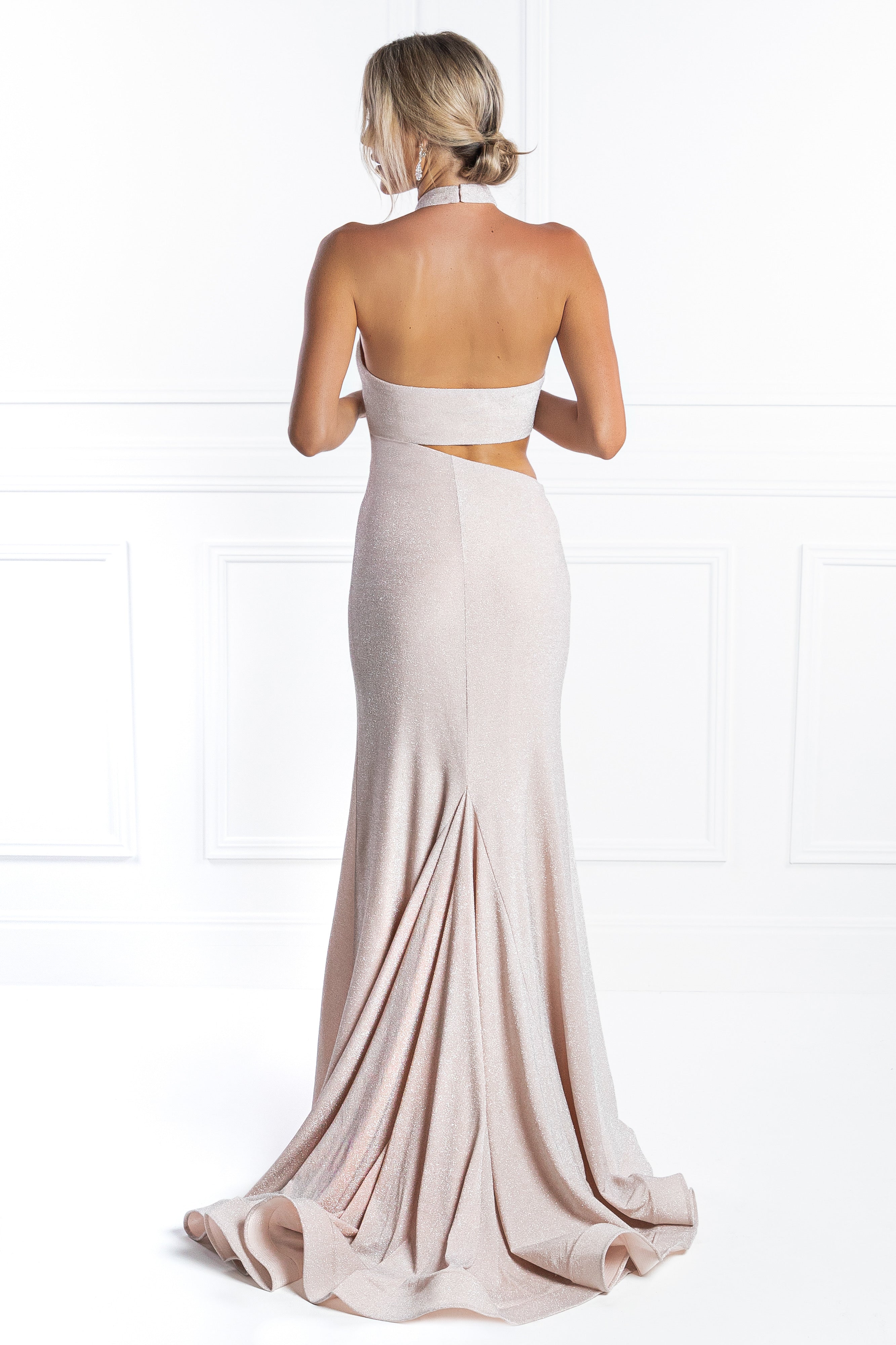 Back view of Honey Couture CAROLINA Pink Cut Out Halter Neck Formal Gown featuring a stylish leg split, perfect for prom or evening events.