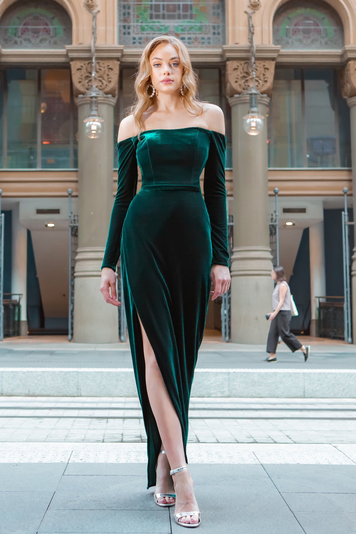 TINA HOLLY COUTURE TA301 emerald velvet dress with side slit, long sleeves. Formal wear for events from Brisbane to Gold Coast.