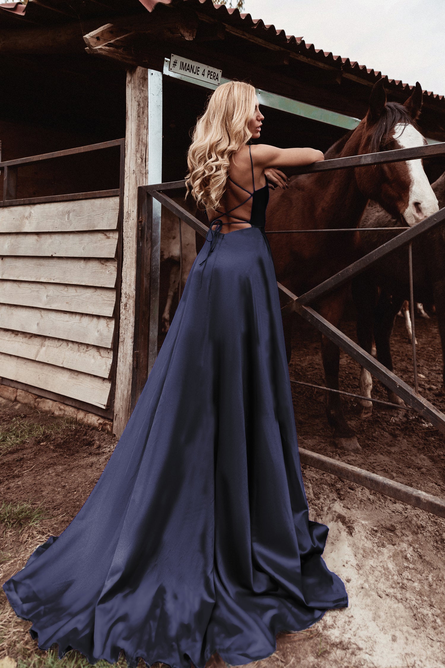 TINA HOLLY COUTURE TE001 Navy blue satin prom gown with lace-up back and leg split, ideal for Brisbane to Gold Coast events.