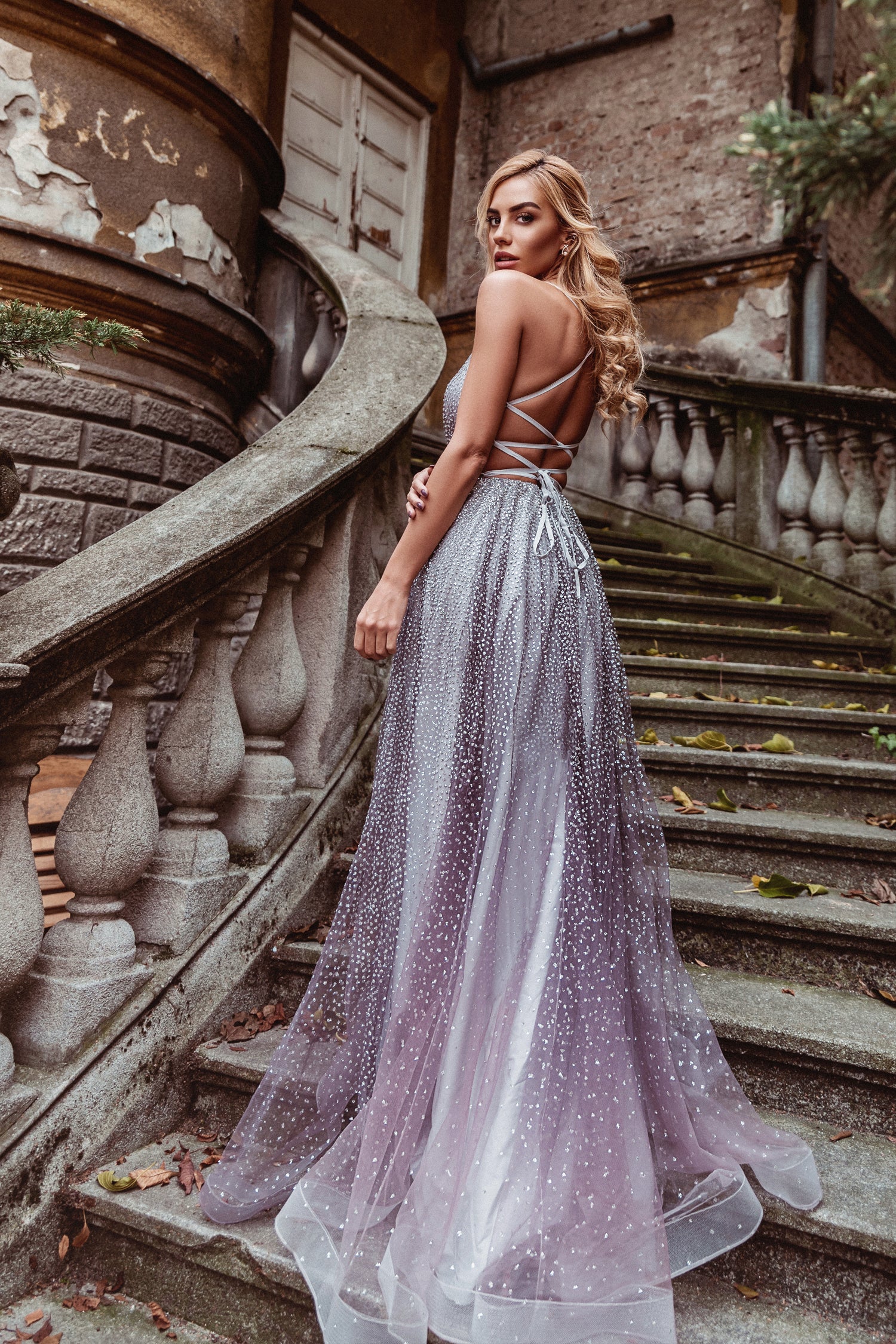 TW020 Musk Purple Shimmer Formal Dress with Open Back on Stairs, Brisbane to Gold Coast