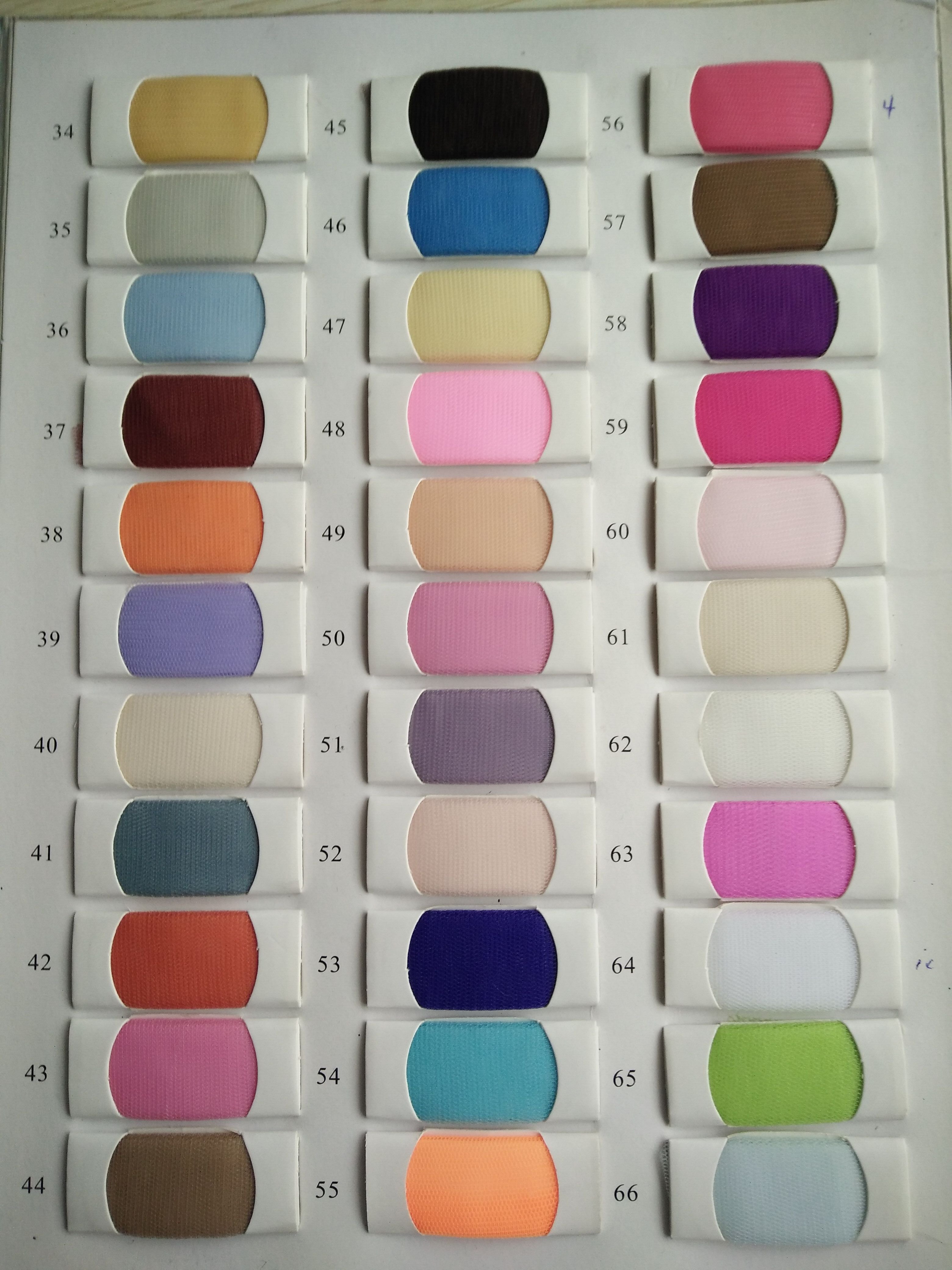 Fabric color swatches numbering from 34 to 66 showcasing various shades for custom design selection.