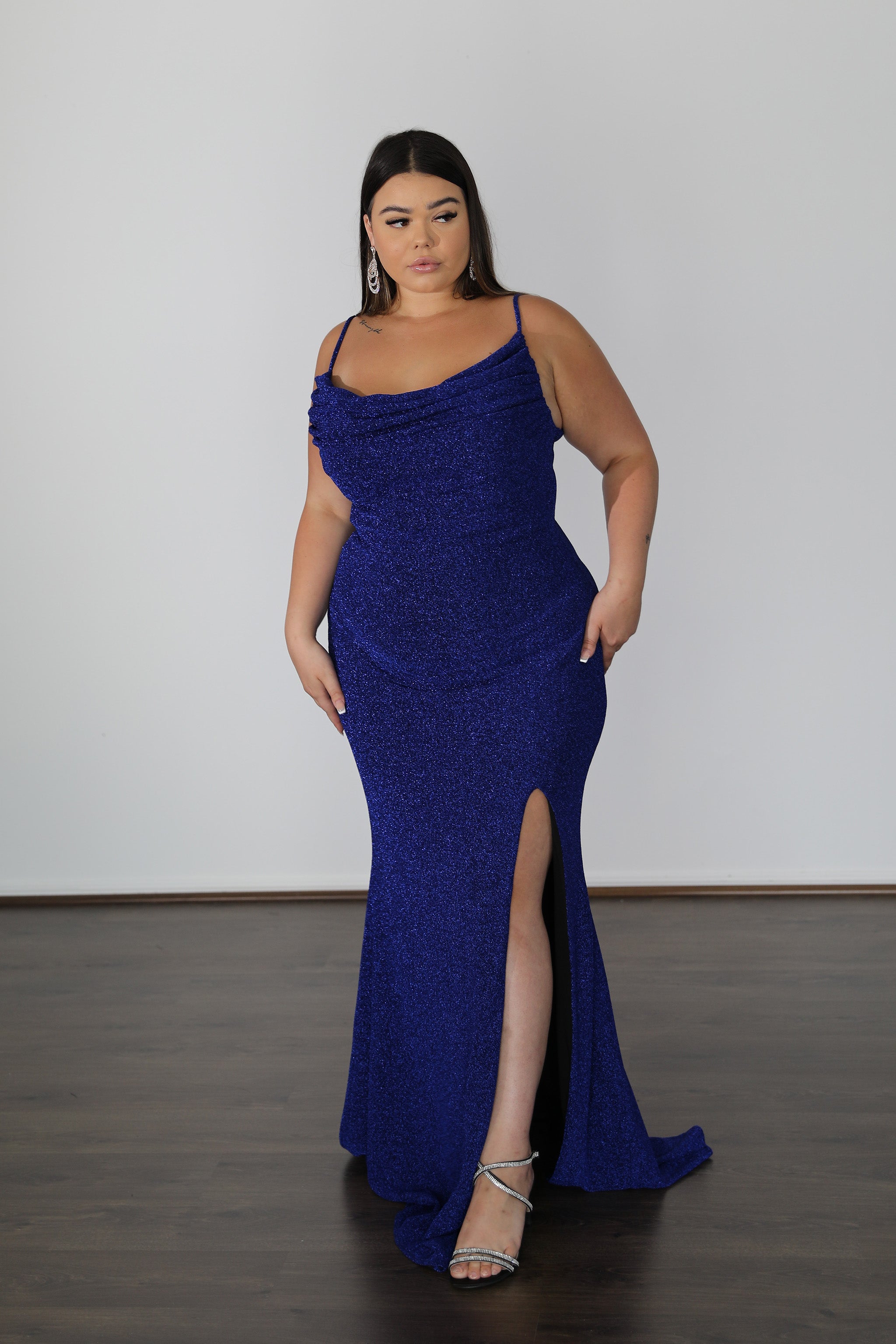 ISSY Metallic Jersey Dress with cowl neckline, Curve Size school formal gown featuring a thigh-high slit. Plus Size. Brisbane to Gold Coast.