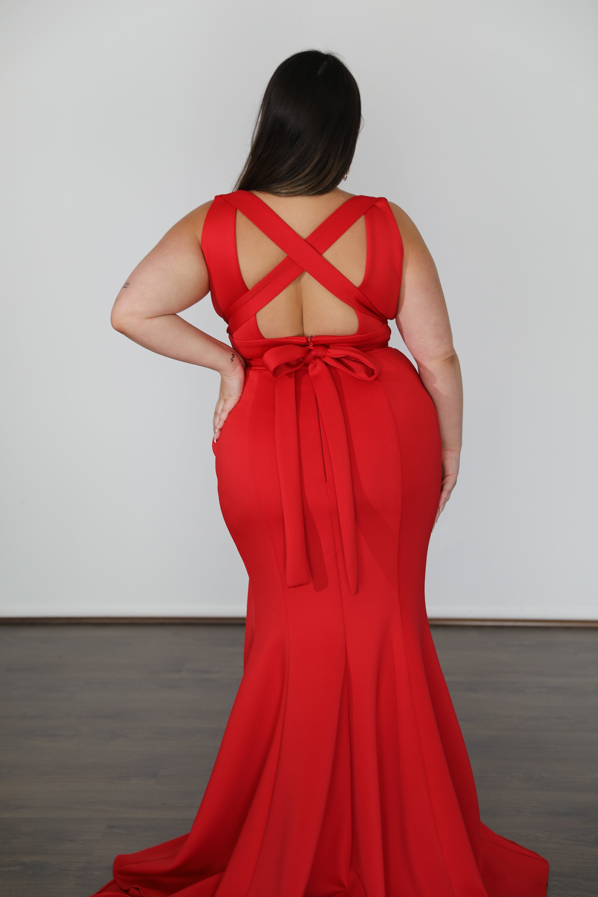 GEMMA red scuba dress with open criss-cross back straps and flowing skirt, perfect for formal occasions. Plus Size Curve. Brisbane to Gold Coast.