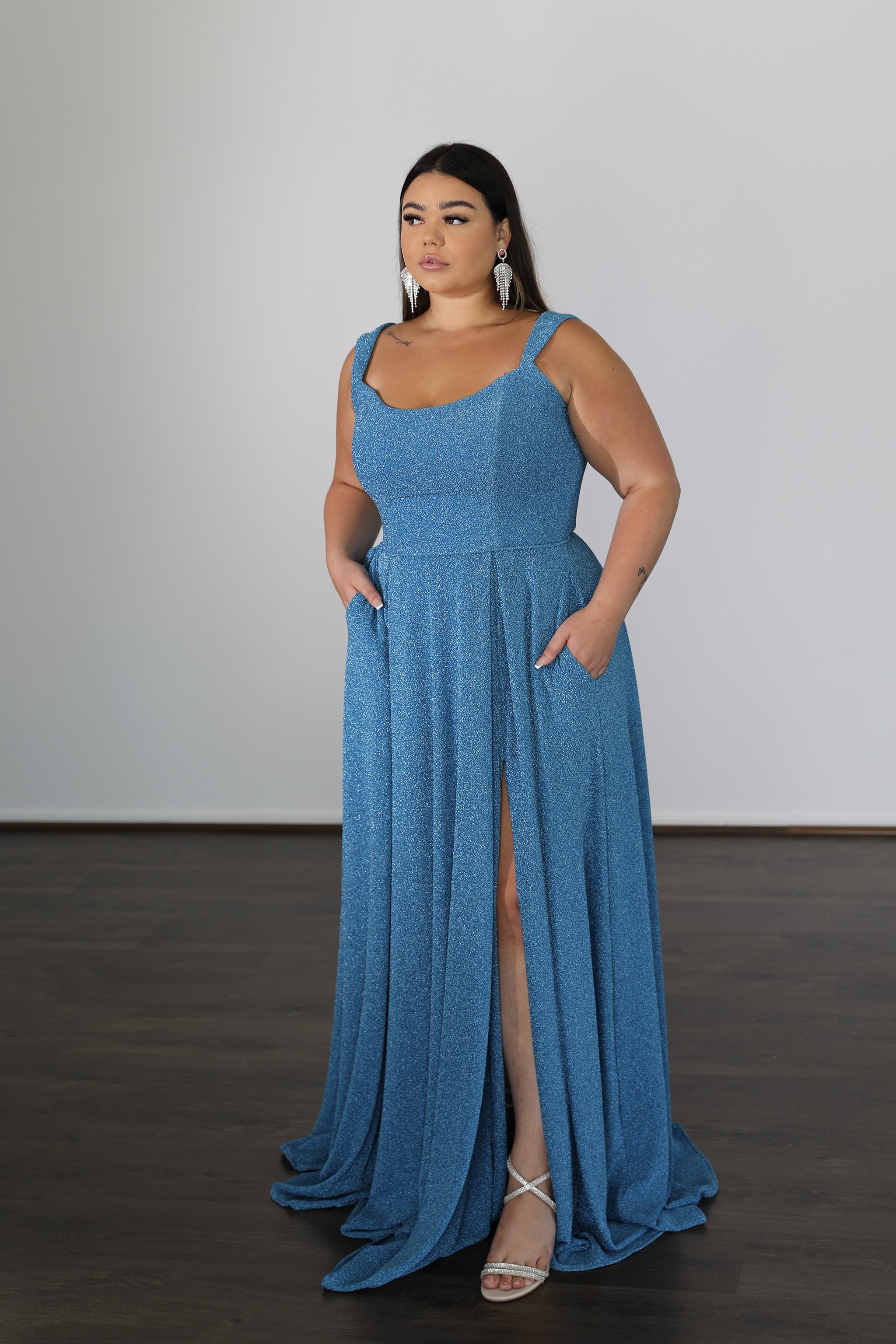 HAYLEY dress in metallic blue with thigh-high split and princess-style skirt. Plus Size, Curve Size evening gown. Brisbane to Gold Coast.