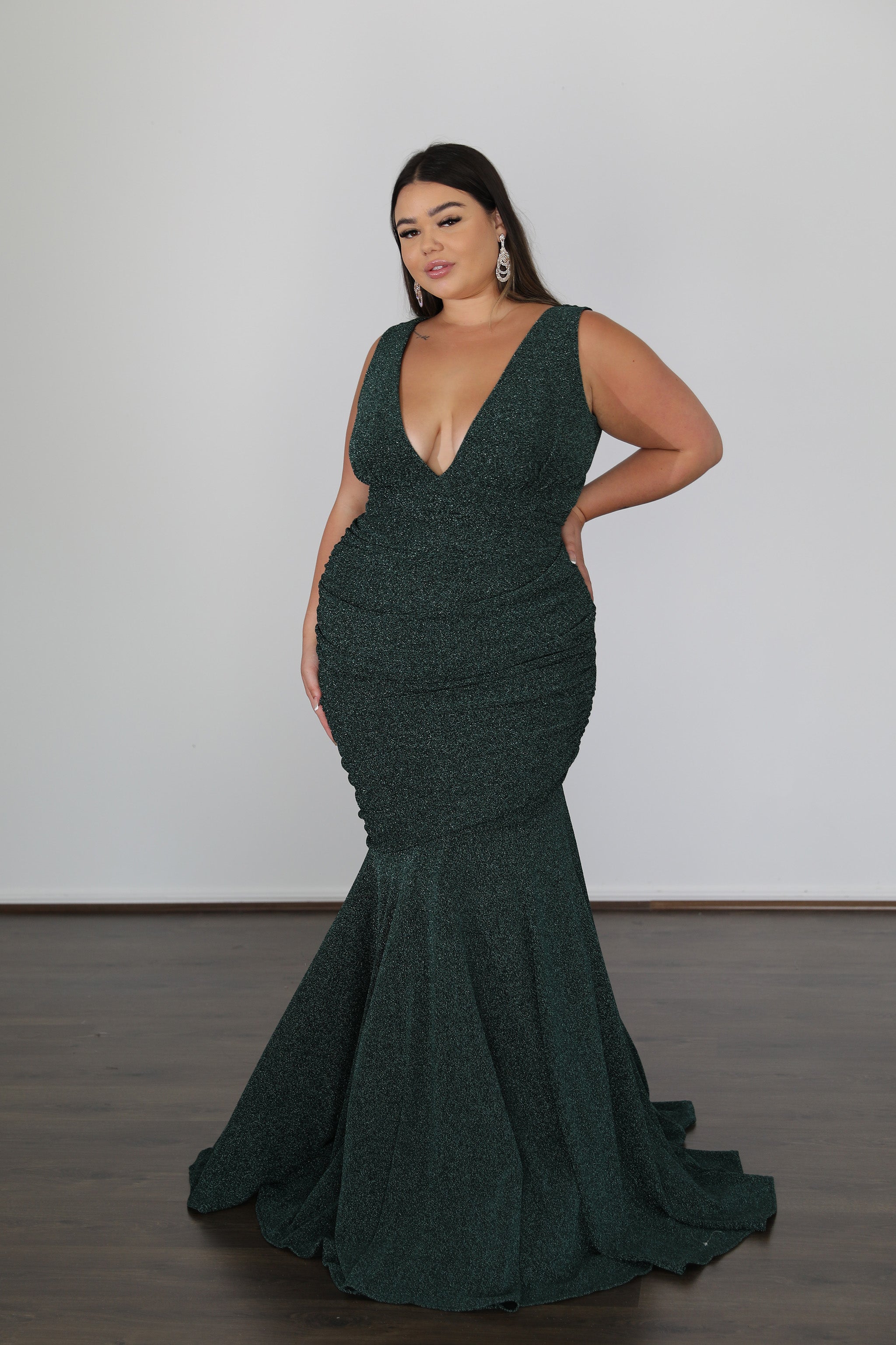 RYLEY Metallic Jersey curve size formal dress with deep V-neck and flared hem, perfect for special occasions. Plus Size, Brisbane to Gold Coast.