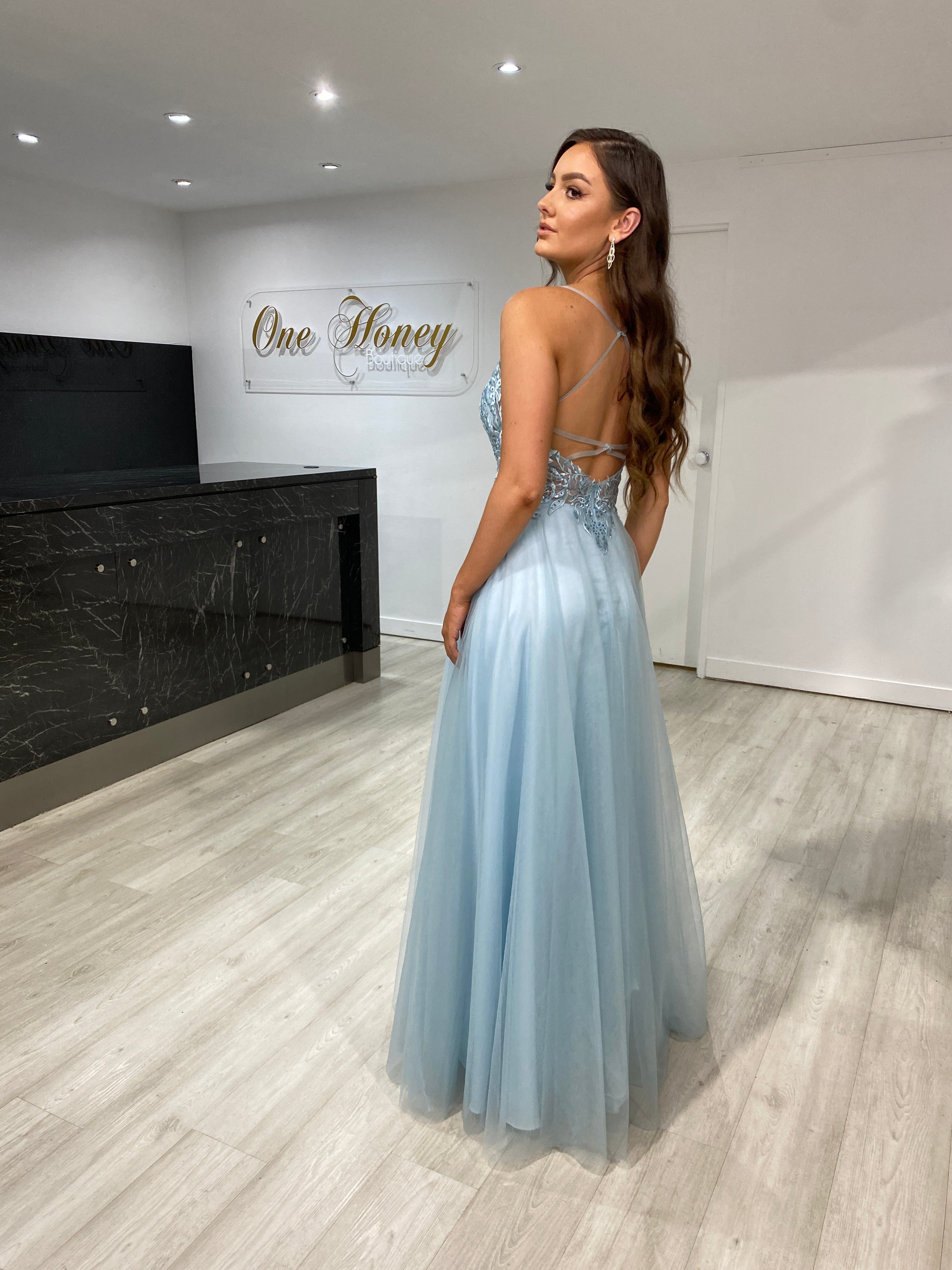 Model wearing Honey Couture INEZ Baby Blue Tulle Lace Gown, an affordable evening gown by an Australian designer, perfect for prom or formal events.