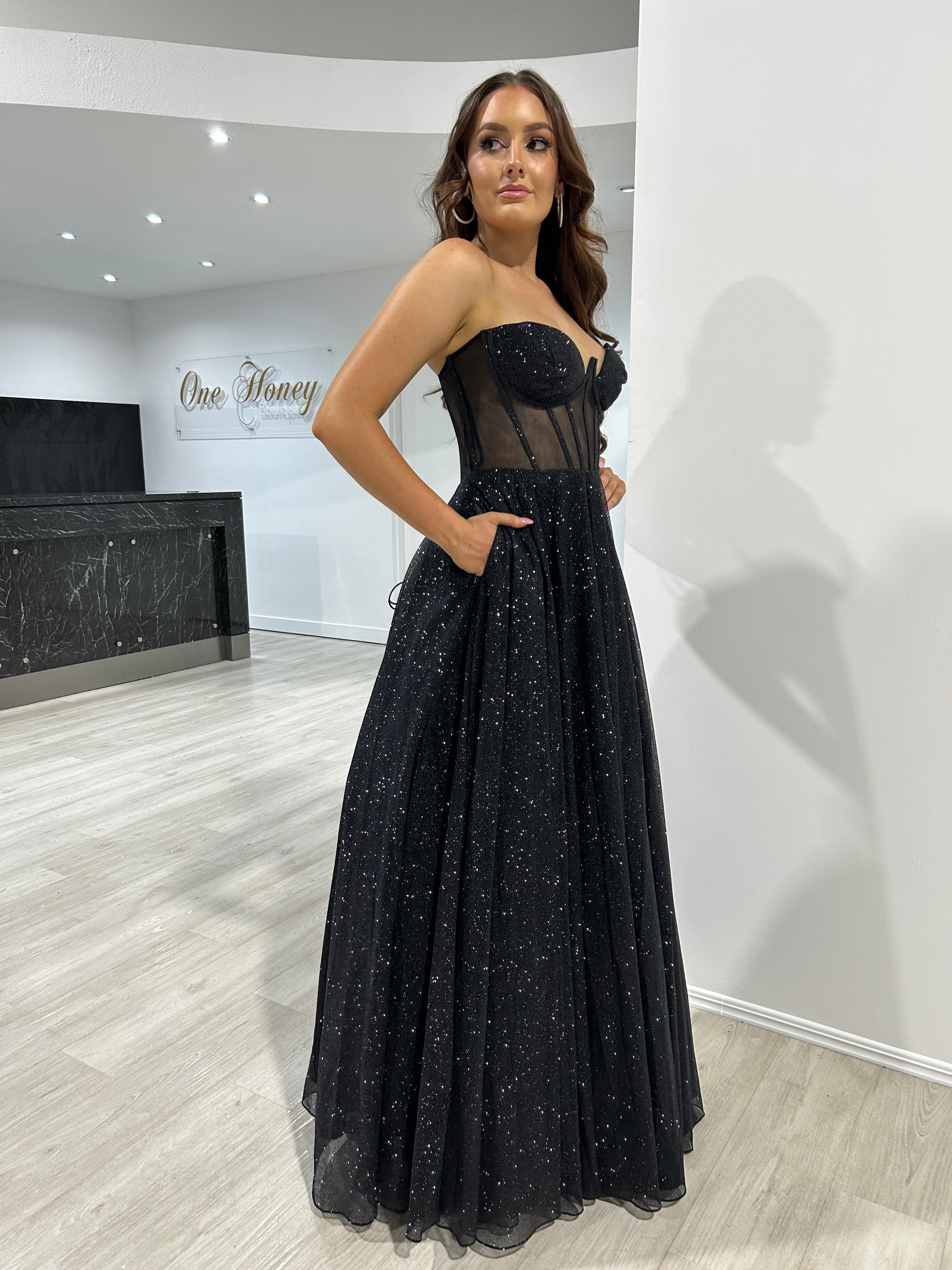 ALOMA Glitter Corset Strapless Formal Dress featuring a sheer boned bodice and fitted silhouette. Perfect for events from Brisbane to Gold Coast.