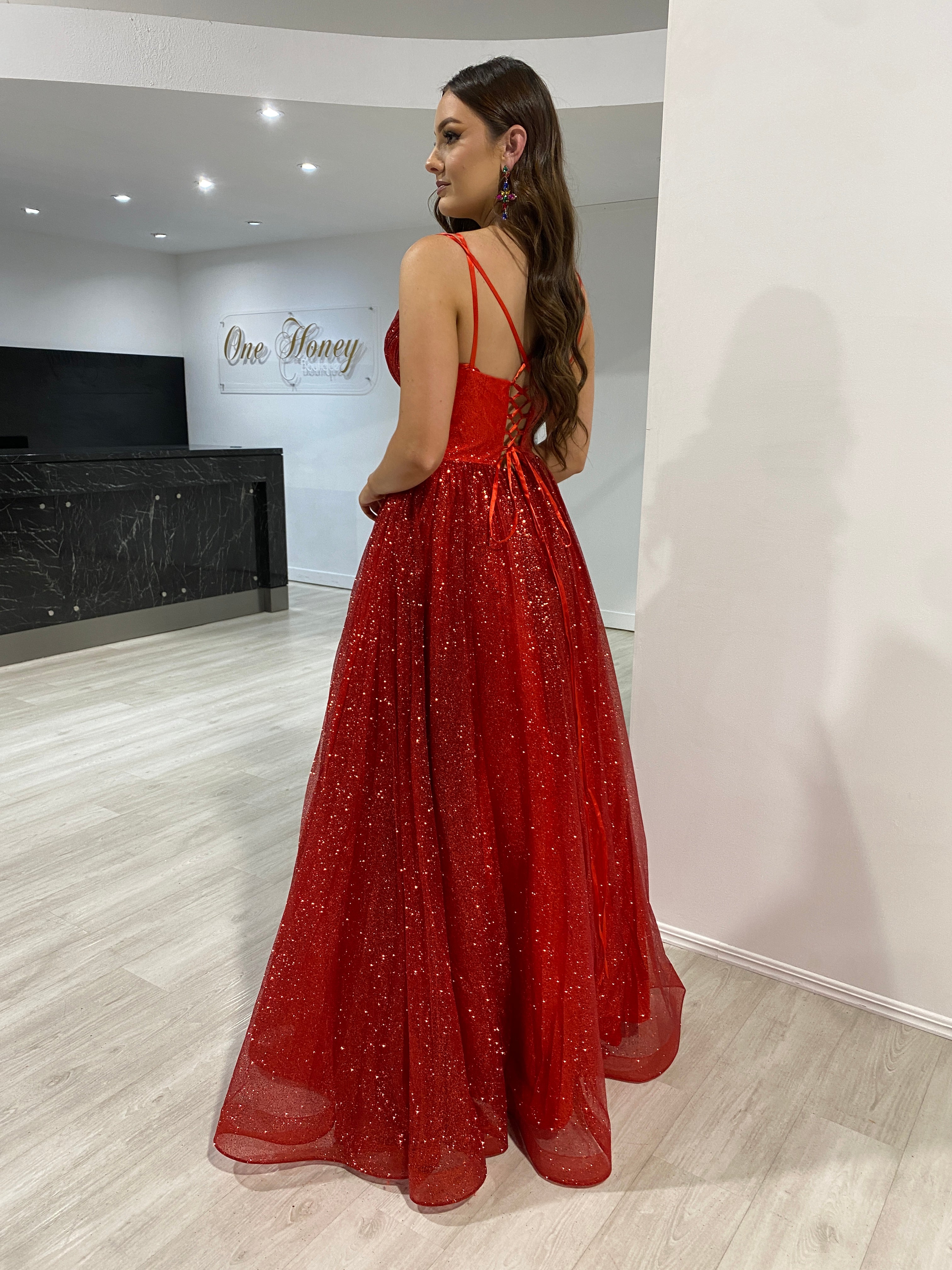 CARMERON Glitter Ball Gown with lace-up back, formal dress perfect for evenings or proms. Elegant red shimmer. Brisbane to Gold Coast.