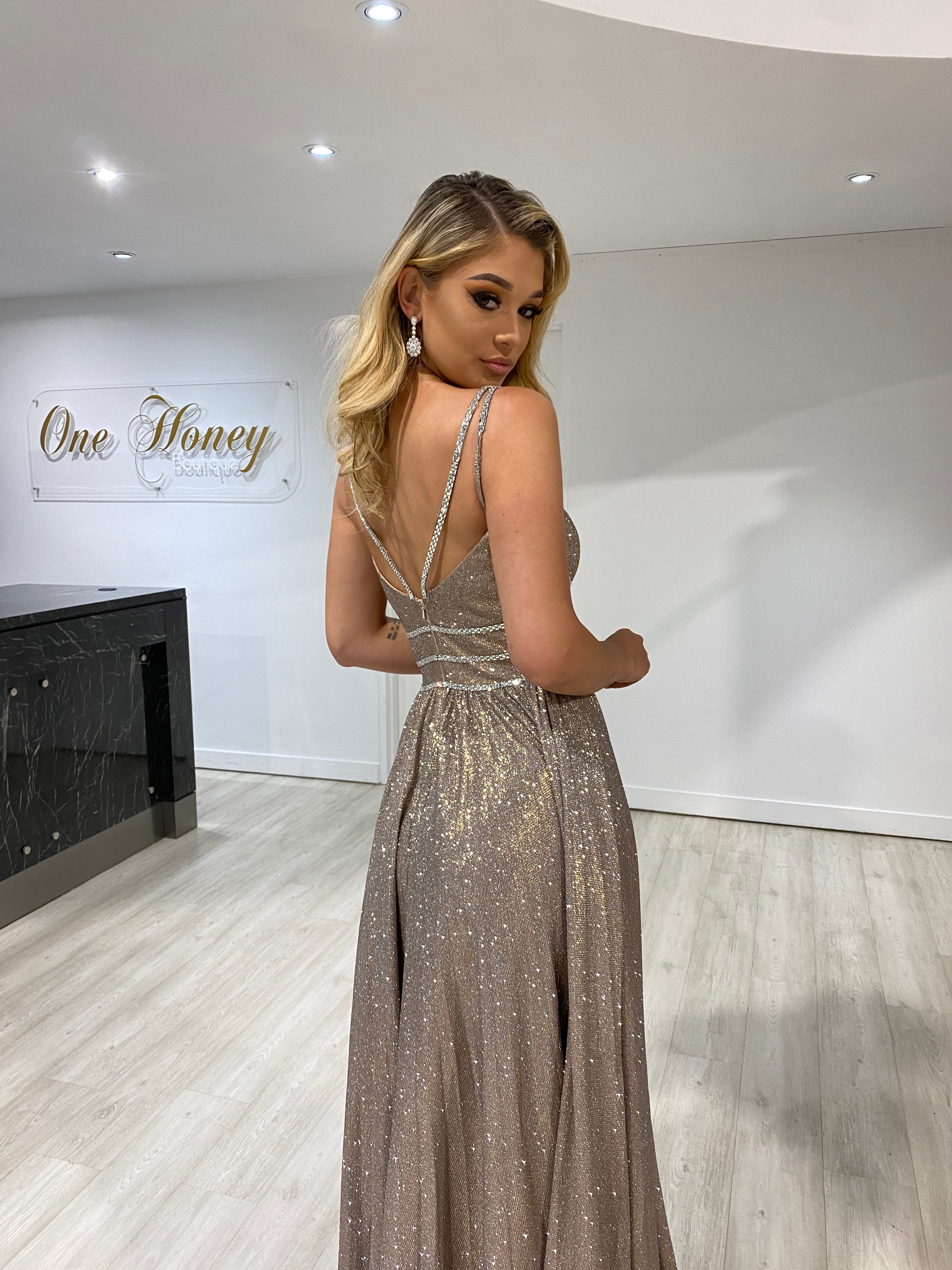 Model wearing Honey Couture ANYA Copper Shimmer A Line Formal Gown by Australian Designer. Ideal for proms and special occasions.