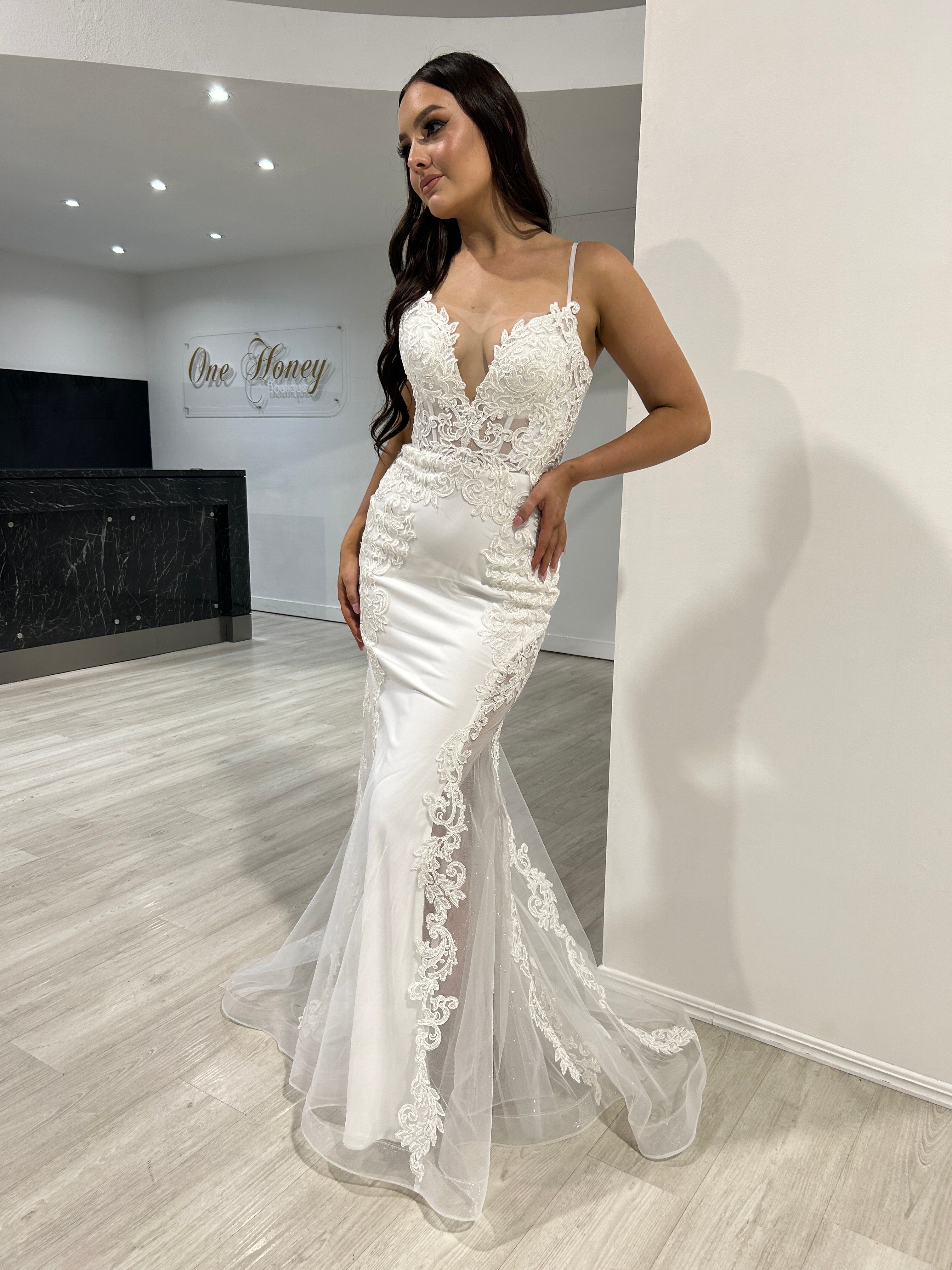 Woman wearing Honey Couture SASKIA Off White Bridal Mermaid Dress with lace, perfect for prom and evening, by Australian Designer.