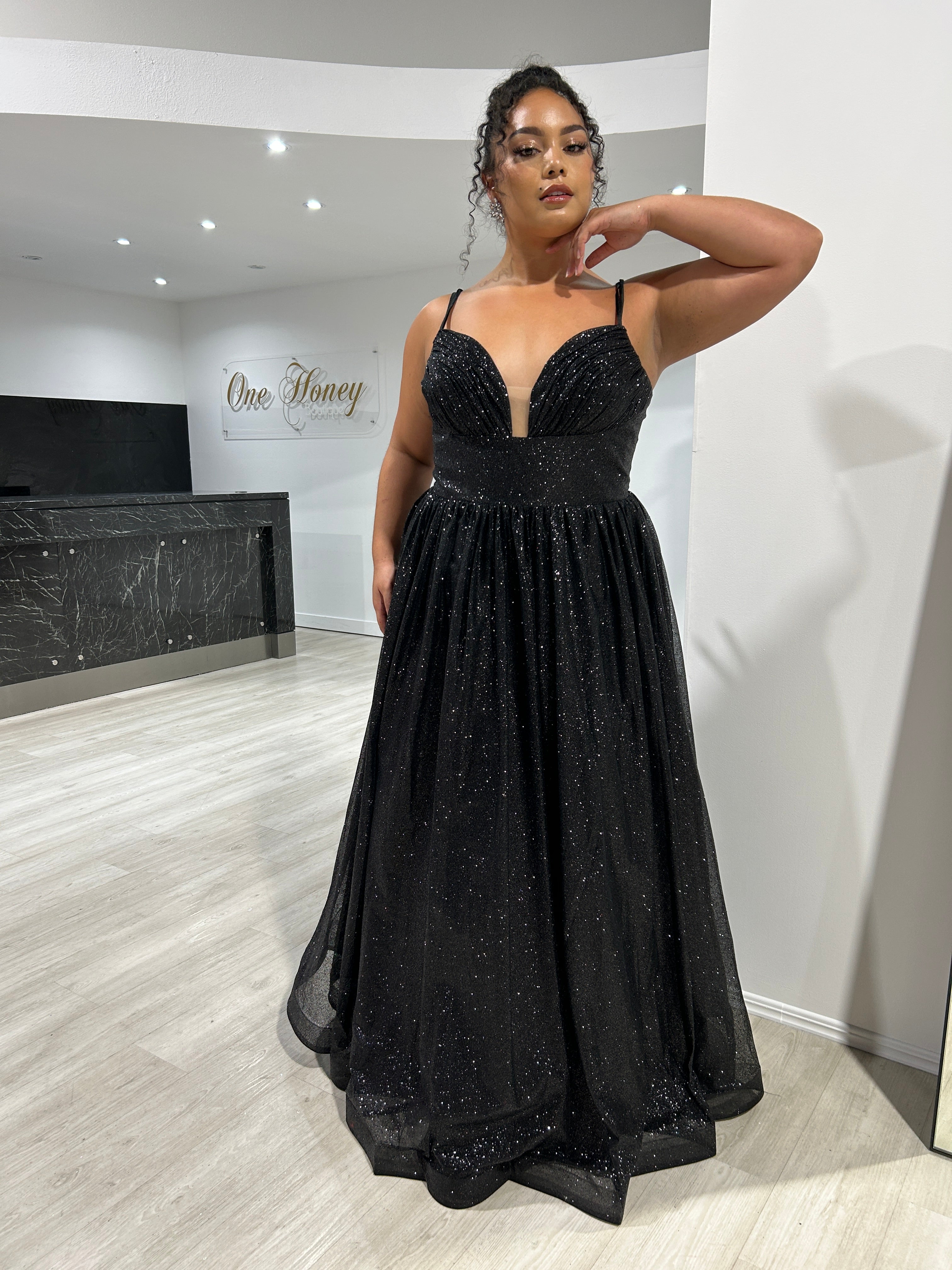 CARMERON Glitter Ball Gown with shimmering glitter corset and deep neckline, perfect as a formal dress. Brisbane to Gold Coast.