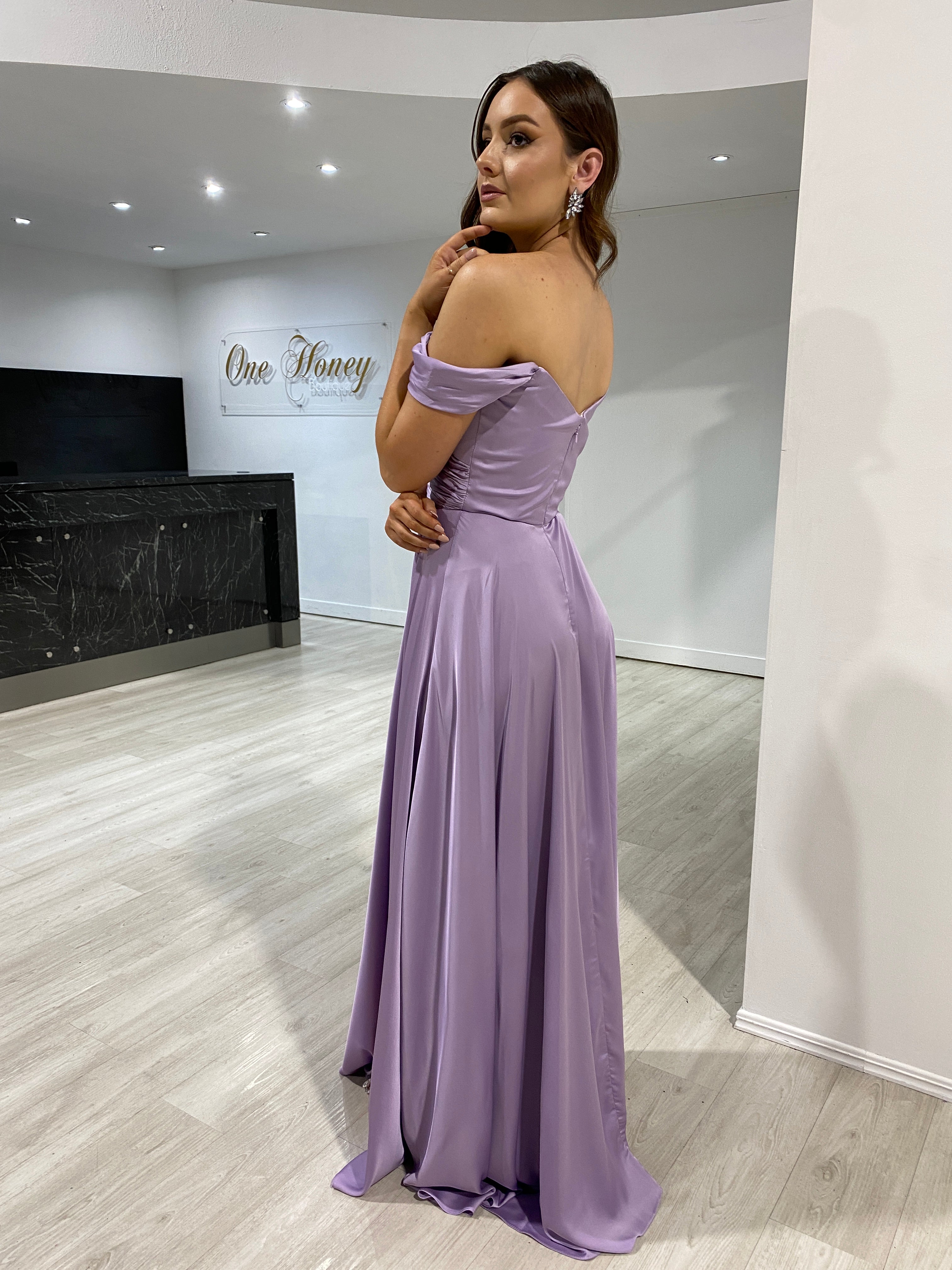 AURA Off the Shoulder Silky A-Line Bridesmaid Dress, featuring a lilac hue and flowing silhouette, Brisbane to Gold Coast, Australia.