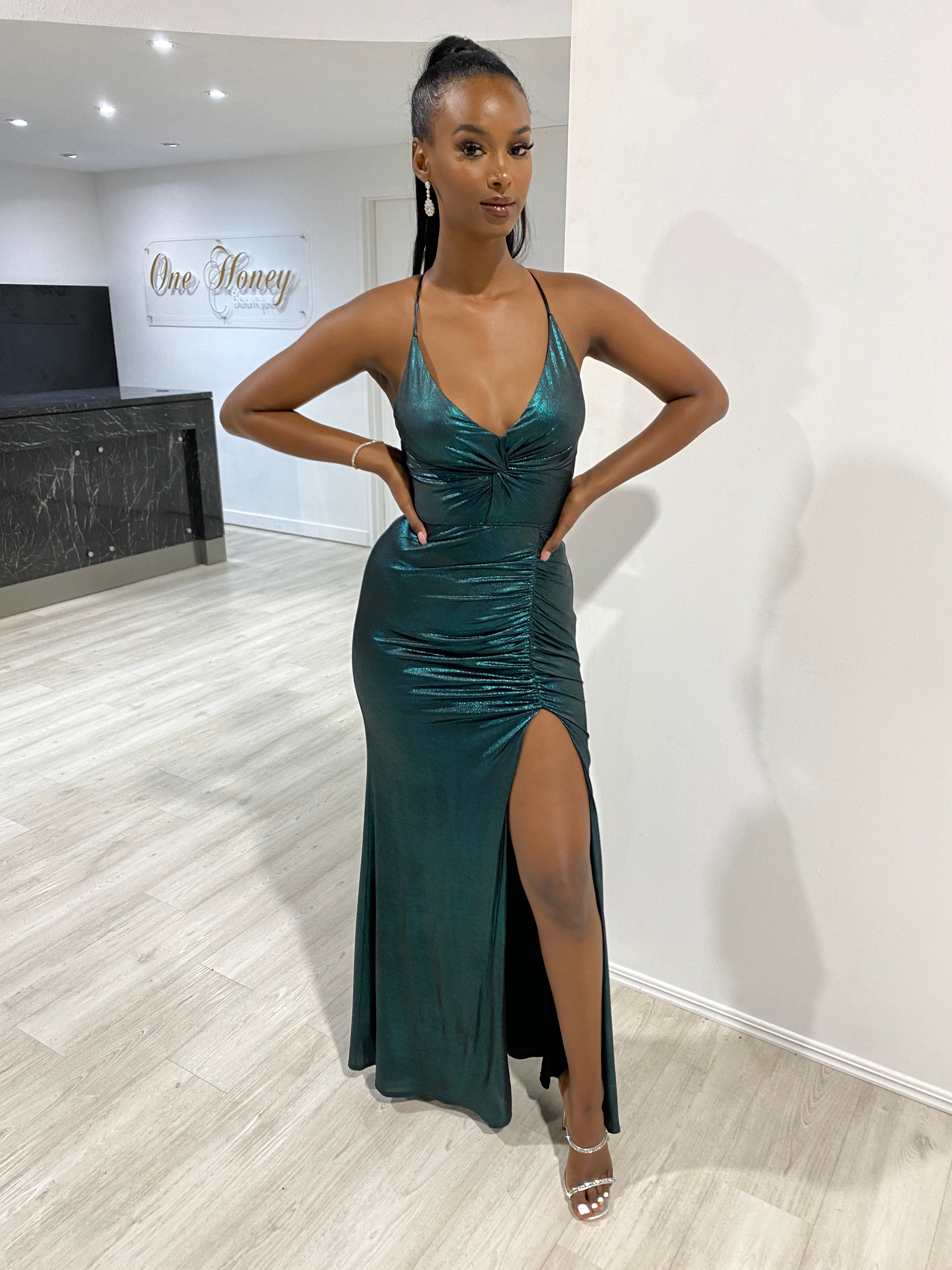 Woman wearing Honey Couture MARI Green Shimmer Lace Back Formal Dress, featuring ruched design and mermaid train, by Australian Designer.