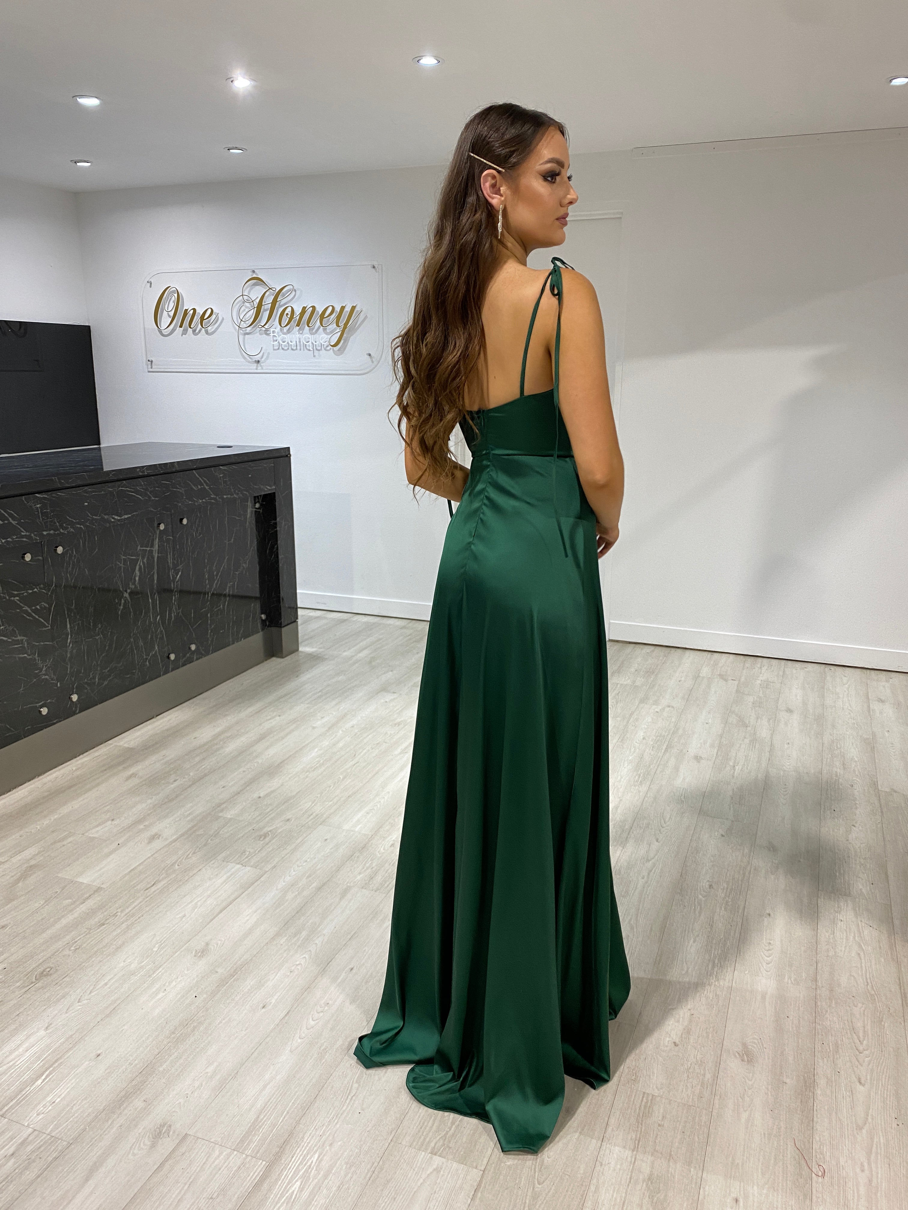 Model wearing Honey Couture XENIA Emerald Green Tie Up Formal Dress, featuring lightweight fabric and elegant design, by Australian Designer.