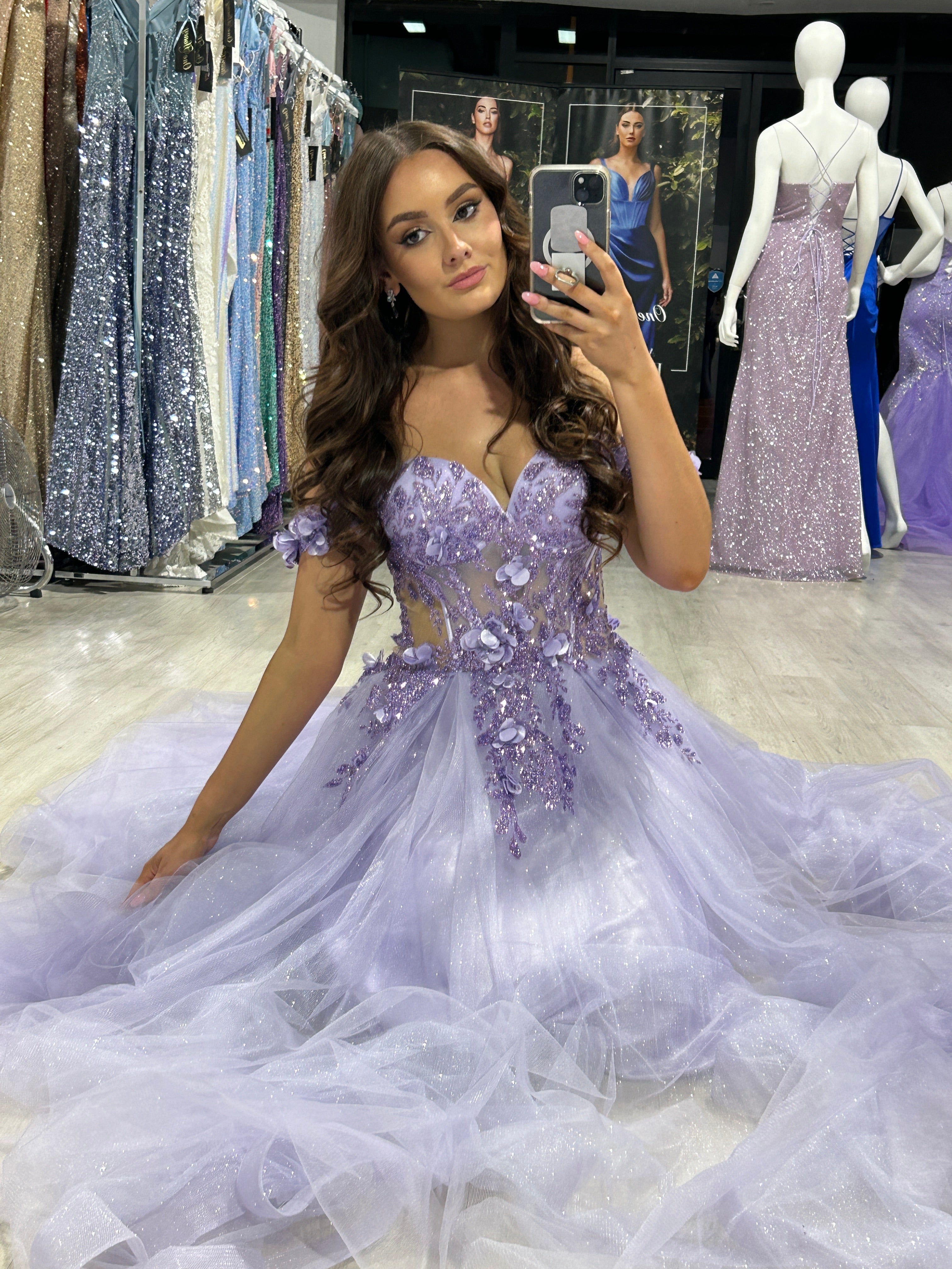 Woman wearing Honey Couture KARRISA Lavender Glitter off-the-Shoulder A-Line Formal Dress, showcasing elegant evening gown by Australian designer.