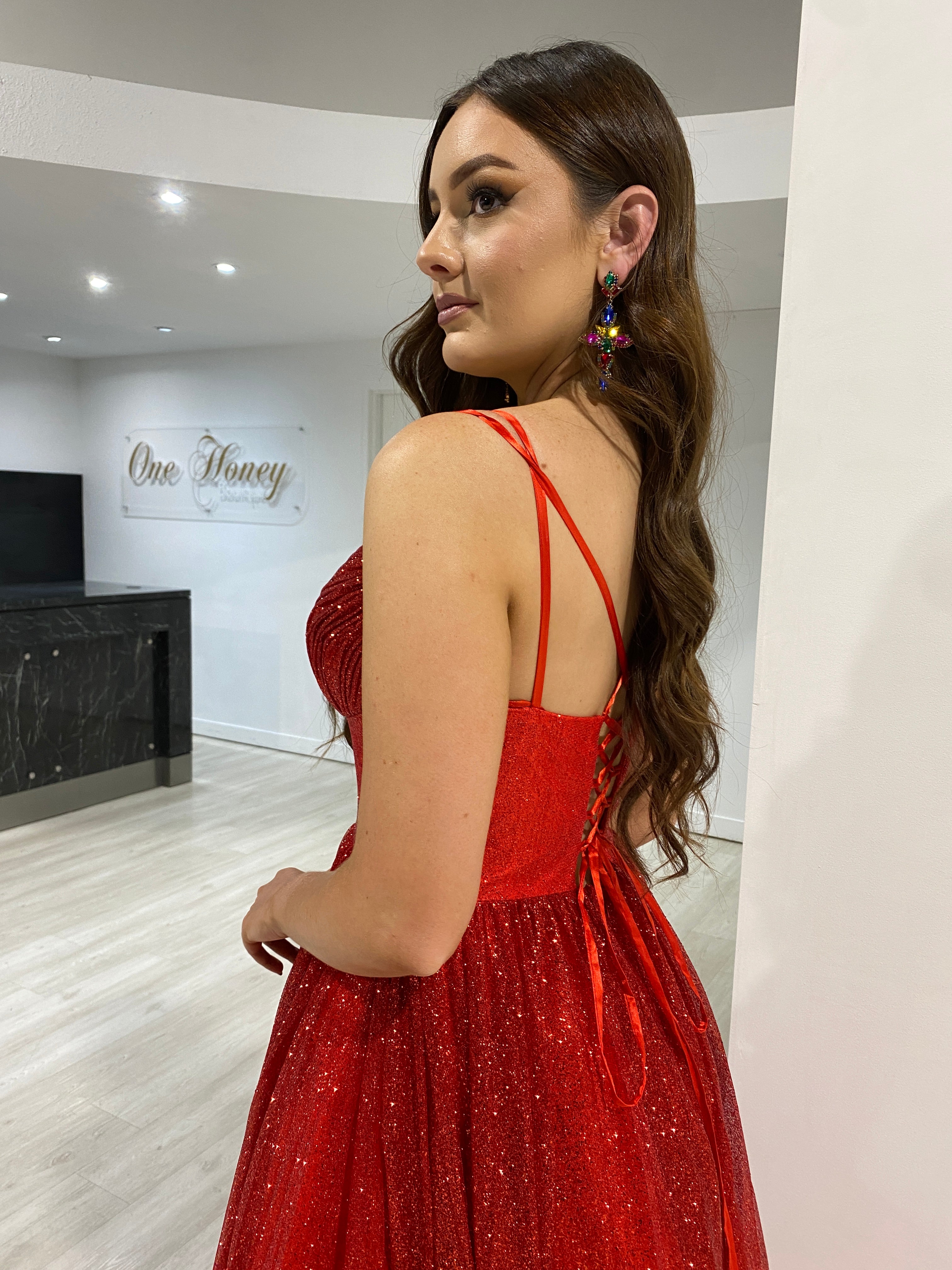 CARMERON Glitter Ball Gown with lace-up back, featuring shimmering layered fabric, perfect for formal events. Brisbane to Gold Coast.