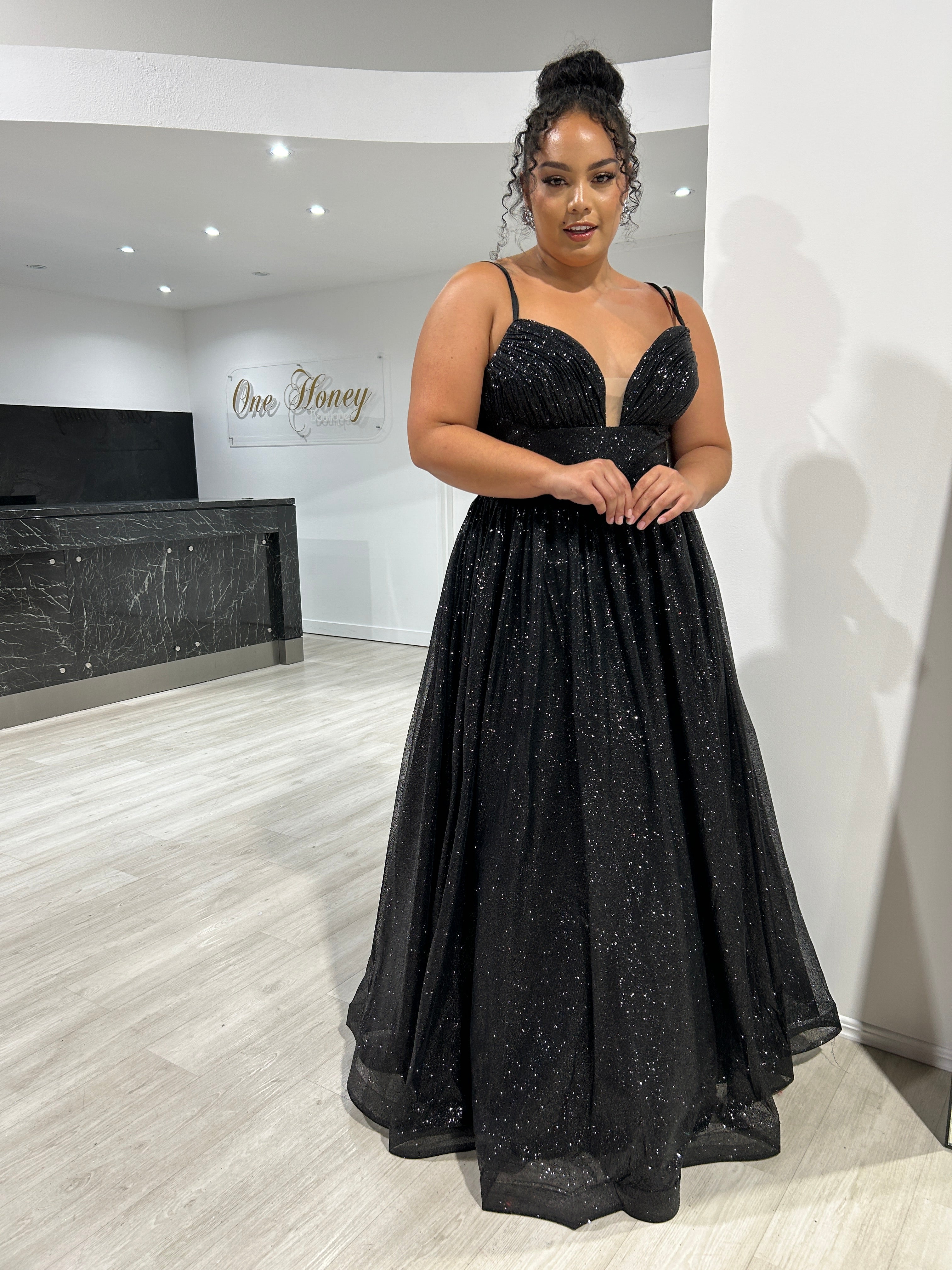 CARMERON Glitter Ball Gown with Lace Up Corset, featuring shimmering fabric and deep neckline, ideal for formal events. Brisbane to Gold Coast.