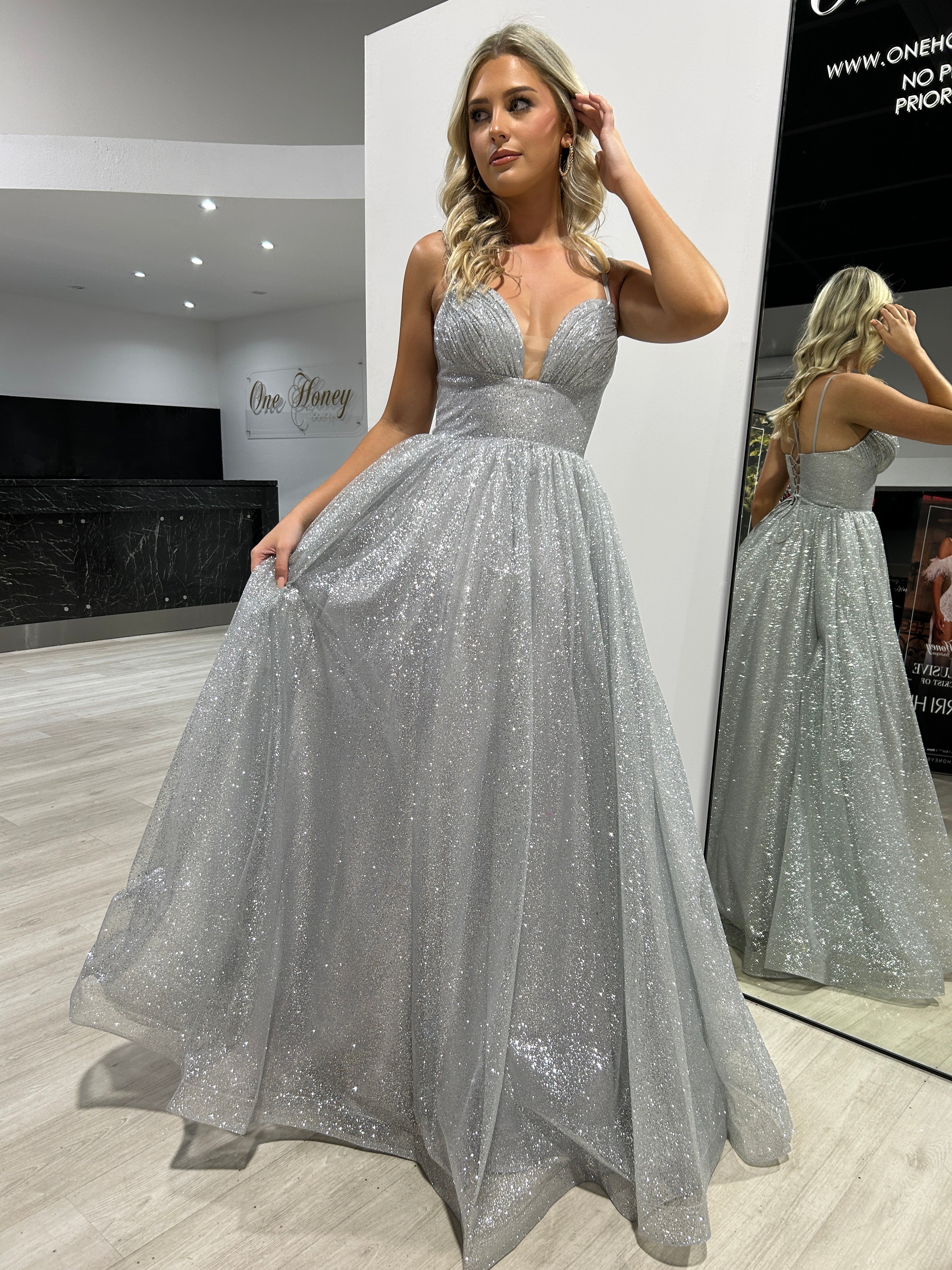 CARMERON Glitter Ball Gown with corset lace-up and deep neckline, perfect for formal events from Brisbane to Gold Coast.
