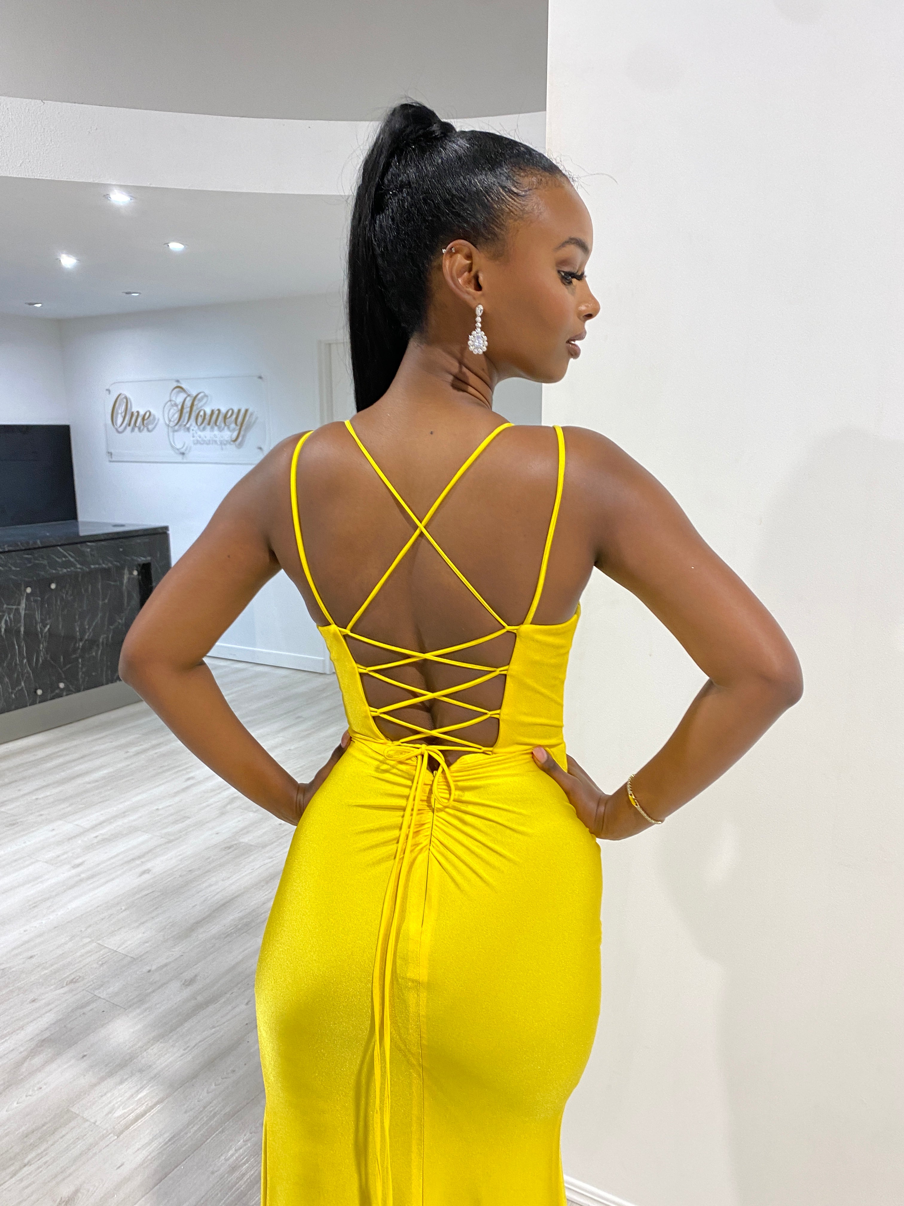 Back view of Honey Couture SOLANGE Neon Yellow Corset Ruched Formal Gown, showcasing lace-up details and mermaid train. Australian Designer.