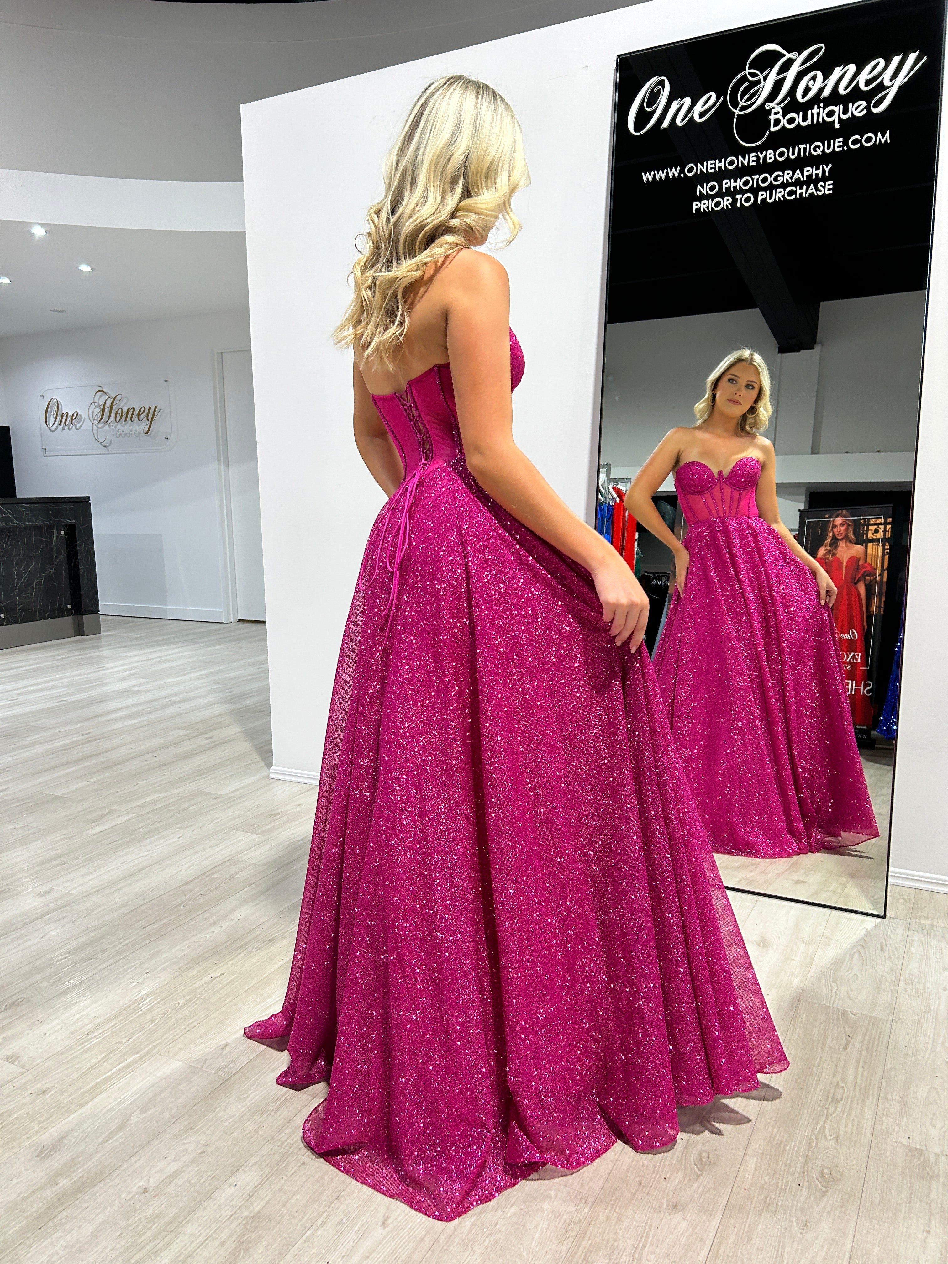 ALOMA glitter corset strapless ball gown in pink, featuring a shimmering fitted bodice. Perfect for formal events, Brisbane to Gold Coast.