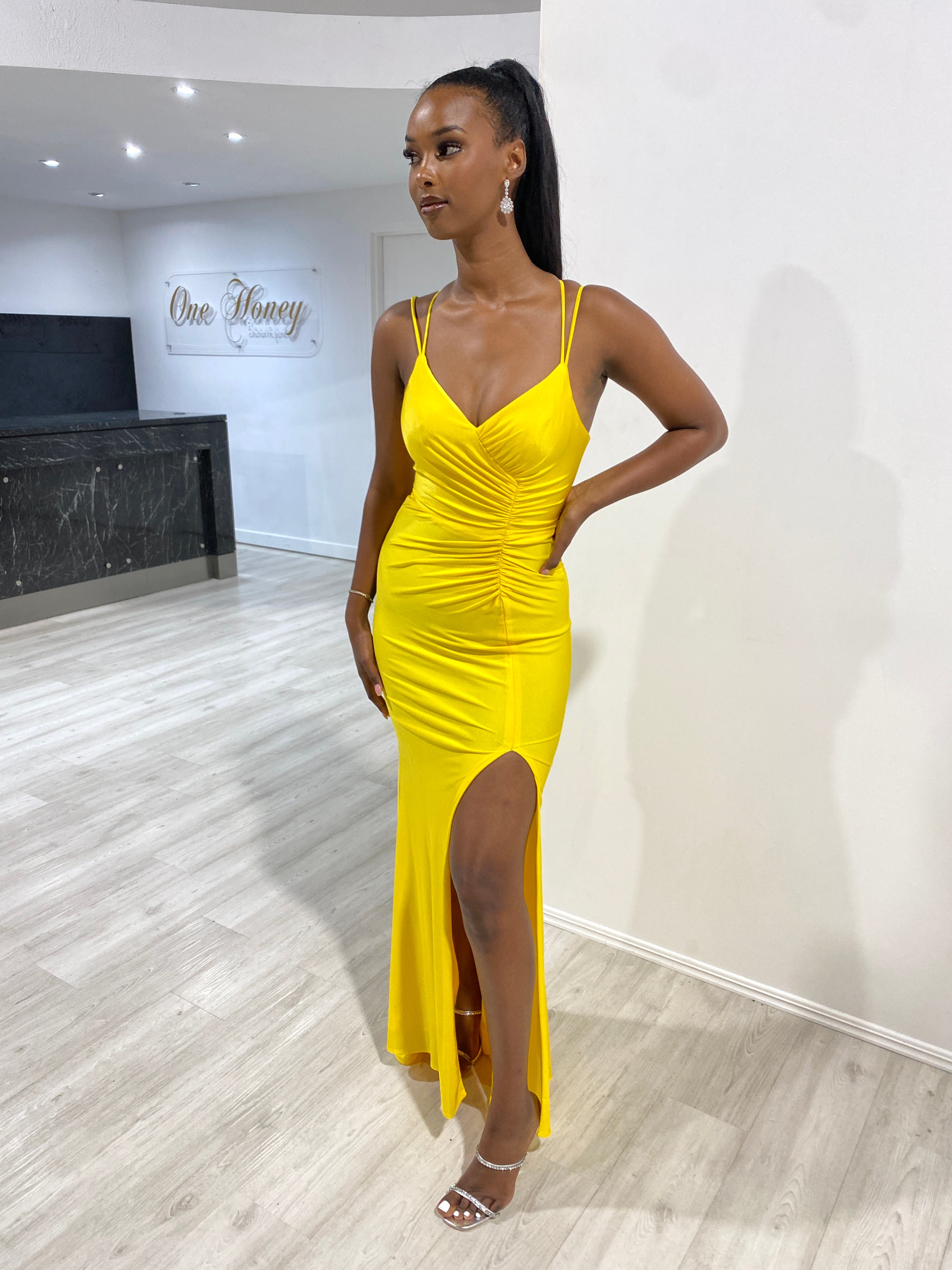 Model wearing Honey Couture SOLANGE Neon Yellow Corset Ruched Formal Gown with leg split, perfect prom dress by Australian Designer.