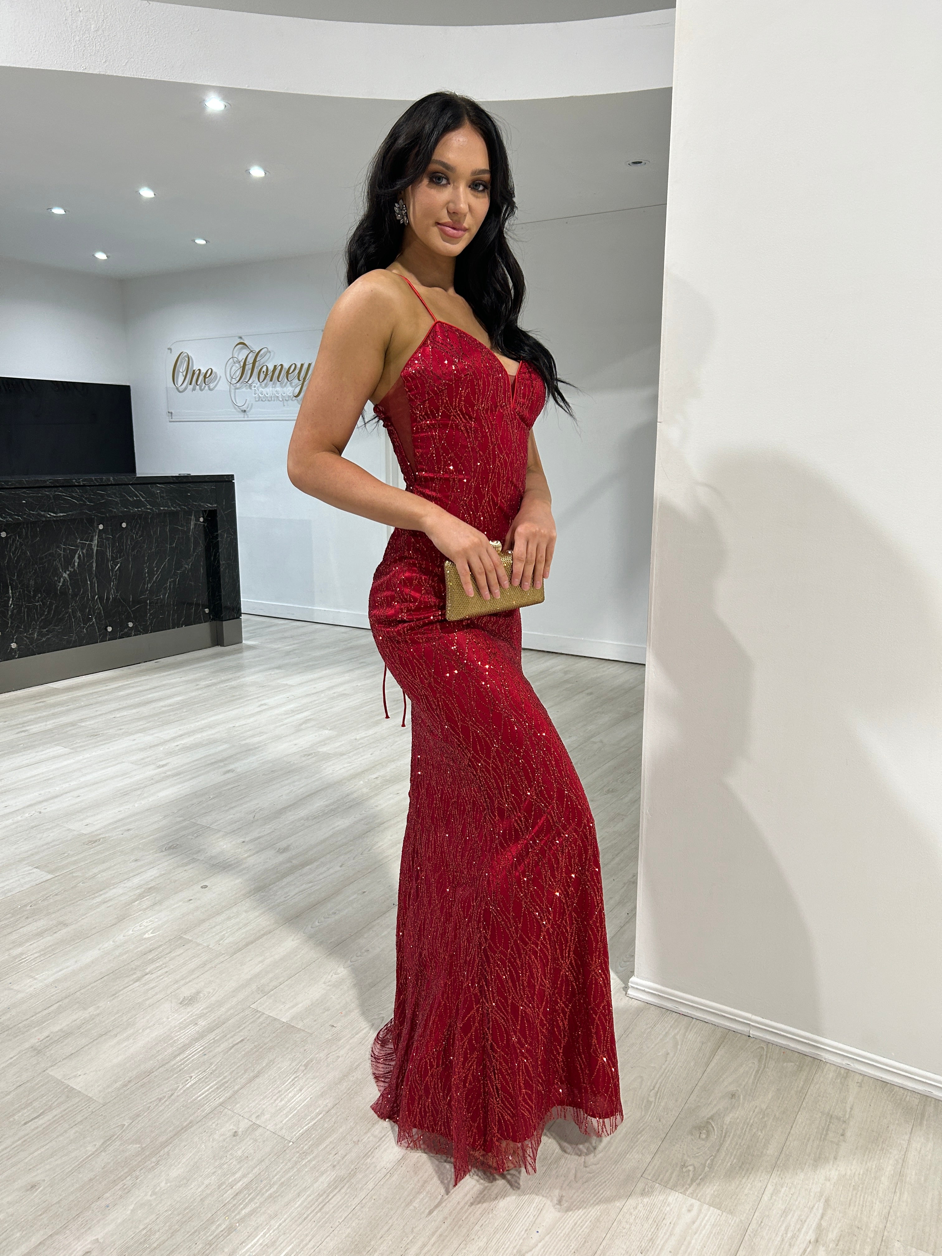 Model in Honey Couture JANESSA red glitter V-front mermaid gown, perfect for formal occasions. Australian designer evening dress.