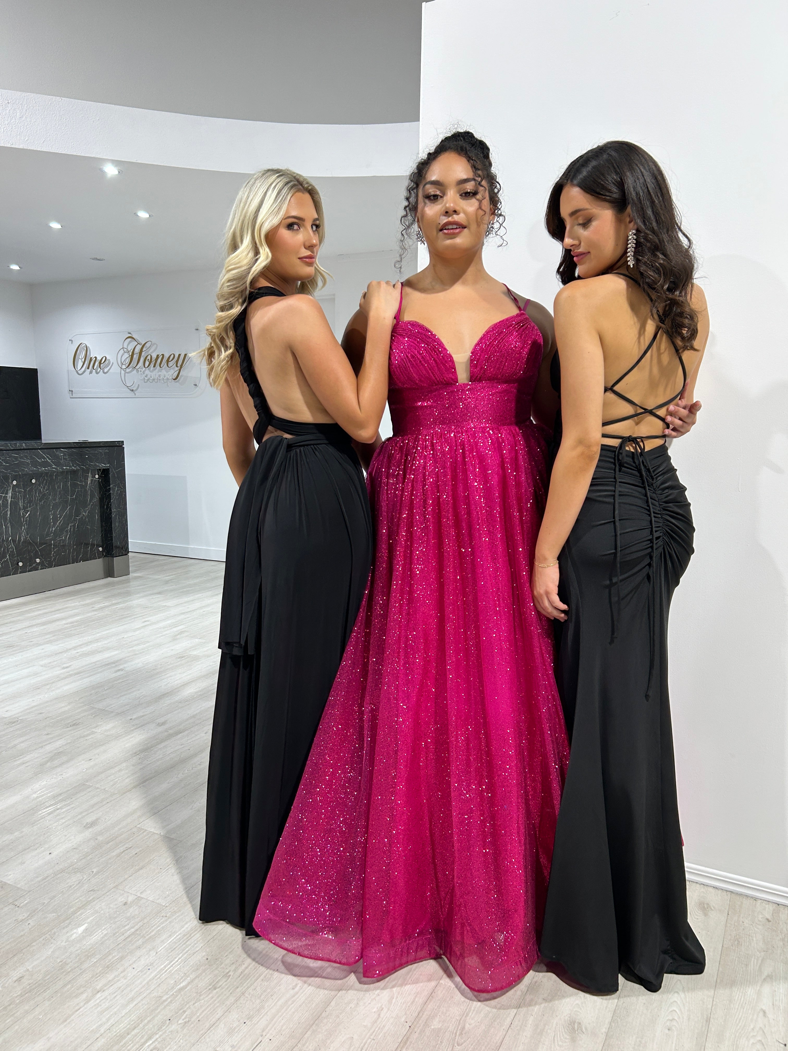 CARMERON Glitter Ball Gown featuring vibrant pink glitter corset and open neckline, ideal for formal occasions. Brisbane to Gold Coast.