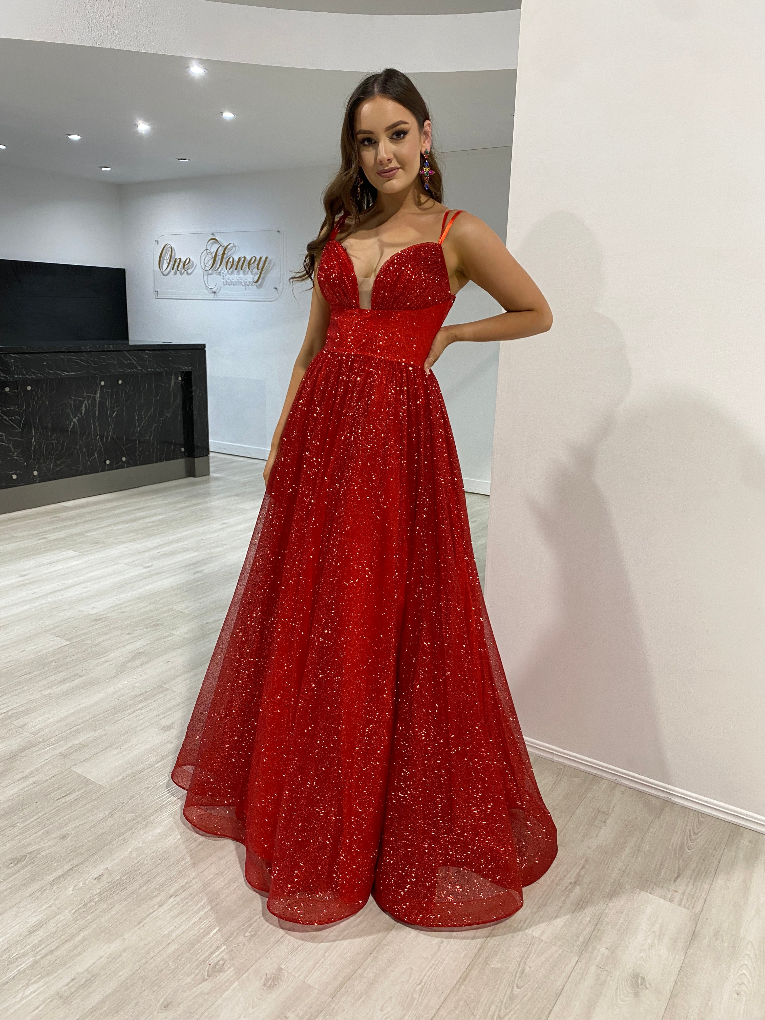 CARMERON Glitter Ball Gown featuring a sparkling corset lace-up and flattering deep neckline. Perfect school formal dress. Brisbane to Gold Coast.