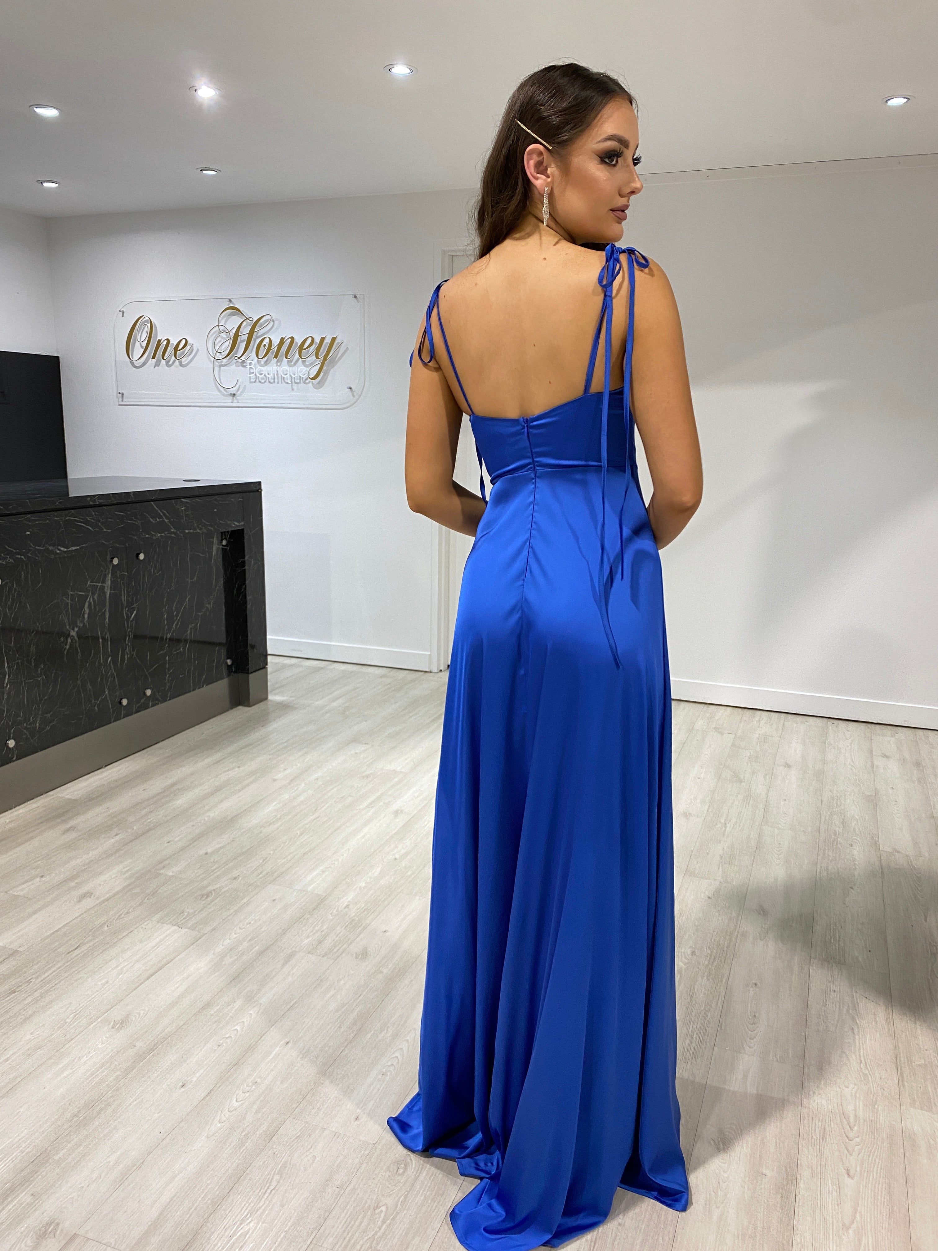 Back view of Honey Couture XENIA Blue Tie Up Formal Bridesmaid Dress, an elegant evening gown from Australian Designer, perfect for proms.