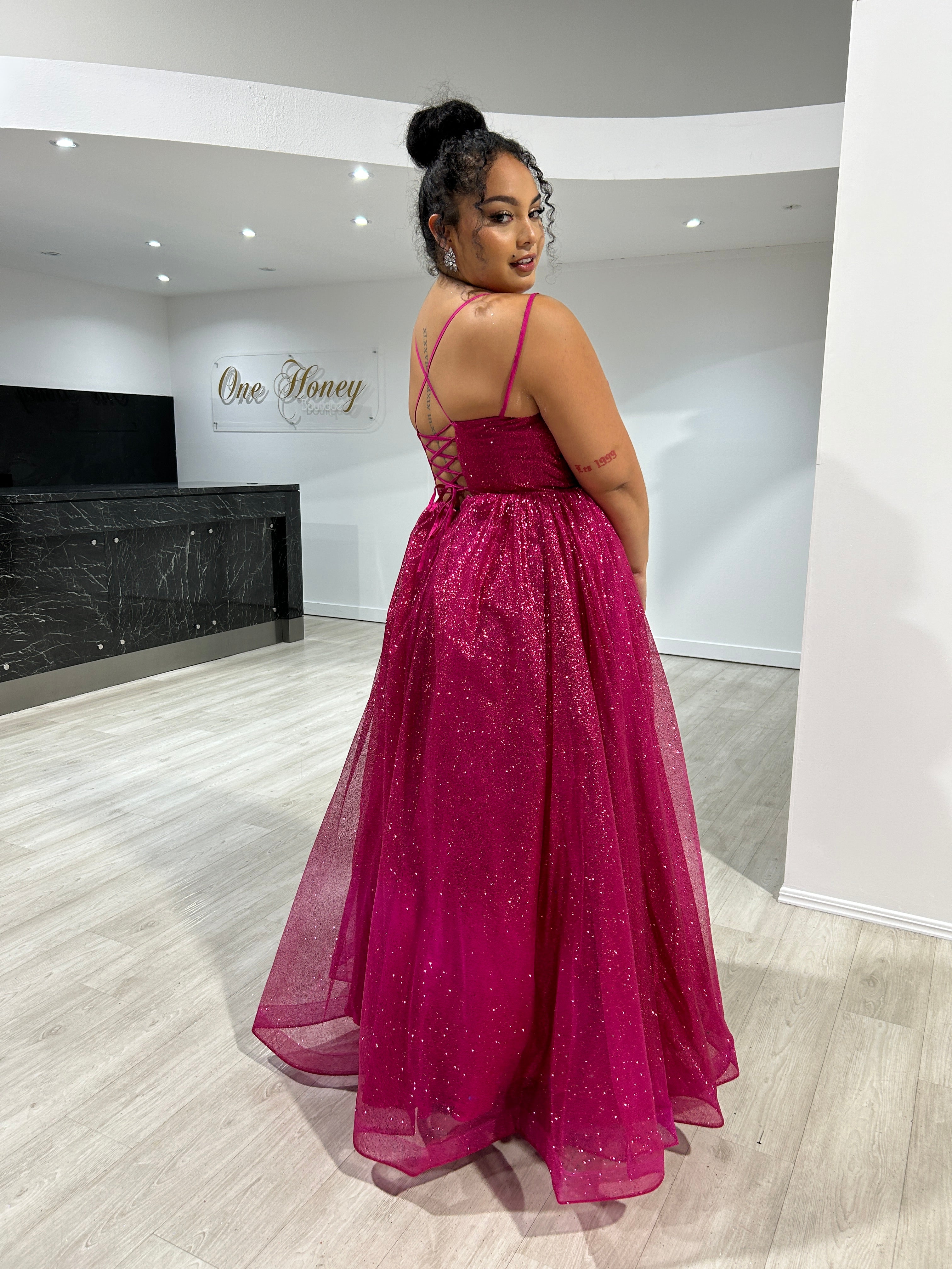 CARMERON Glitter Ball Gown with lace-up corset and shimmering fabric, perfect formal dress for special occasions. Brisbane to Gold Coast.