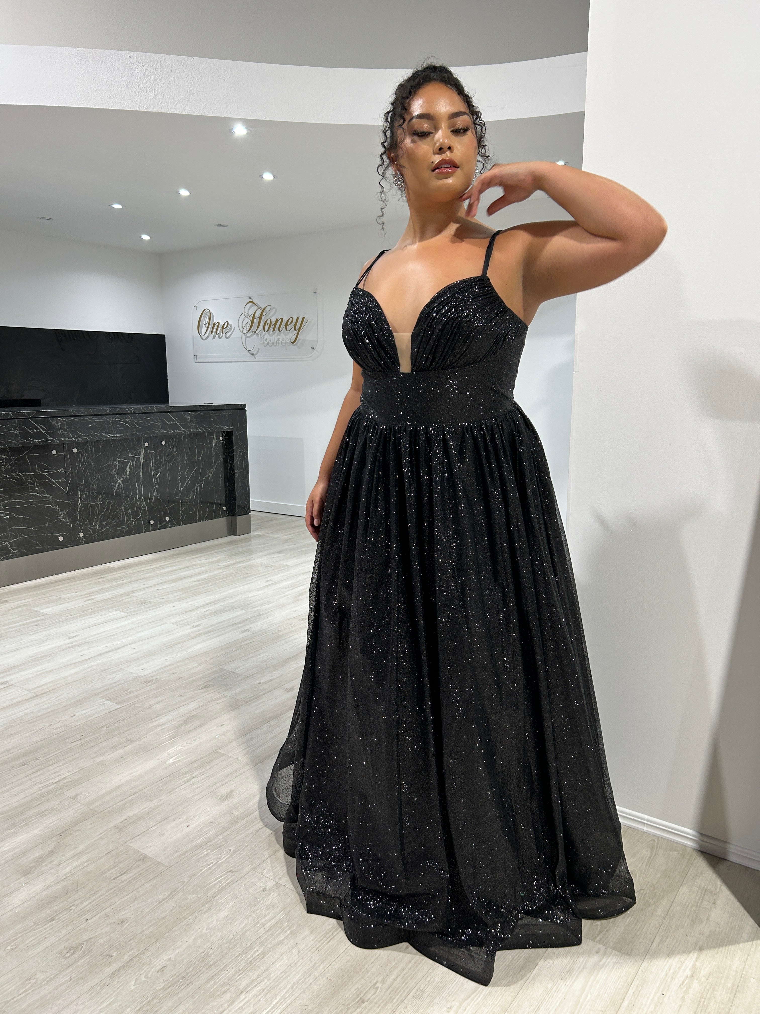 CARMERON Glitter Ball Gown with Corset Lace Up, showcasing a shimmering silhouette, perfect for formal events. Brisbane to Gold Coast.