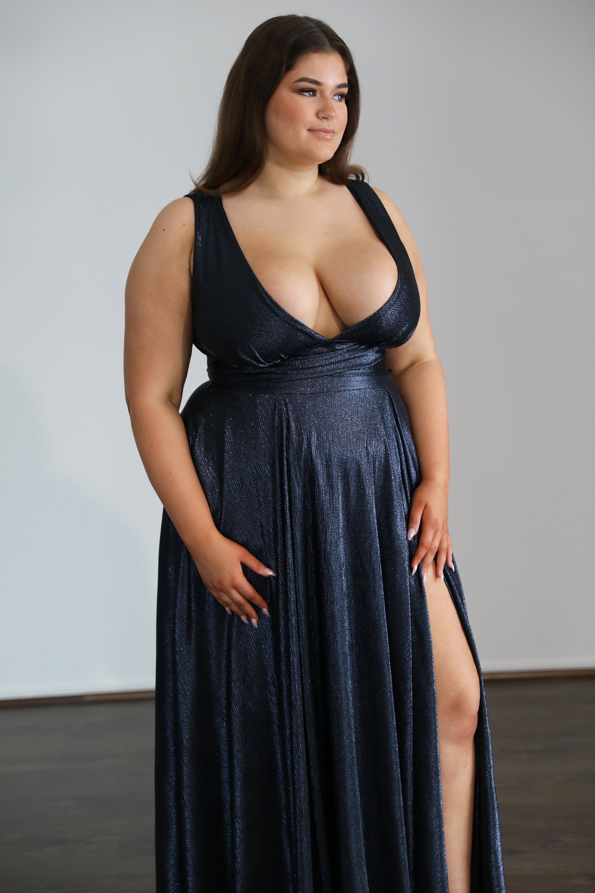 LEXA Stretch Shimmer school formal dress with plunging V-neckline and pleated skirt. Plus Size, Curve Size. Brisbane to Gold Coast.