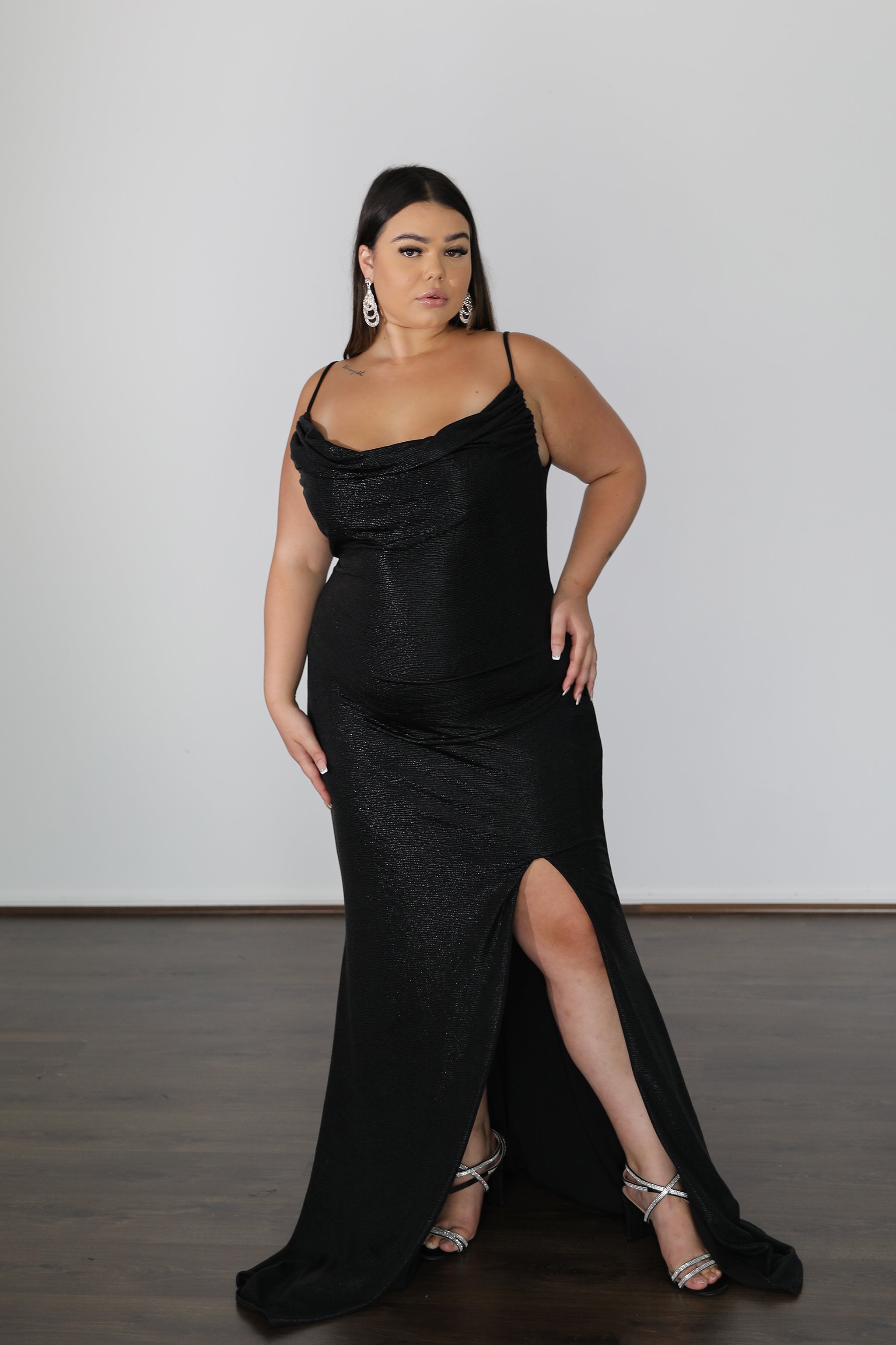 ISSY Stretch Shimmer black curve school formal dress with cowl neckline and thigh-high split. Plus Size, Curve Size. Brisbane to Gold Coast.
