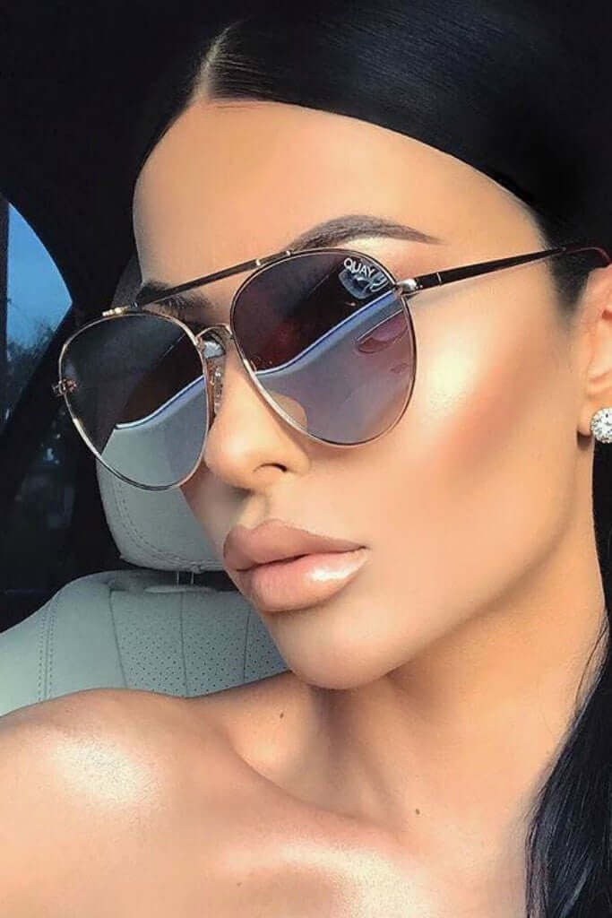 LICKETY SPLIT sunglasses with mirrored lenses on a fashion-forward individual, Brisbane to Gold Coast.