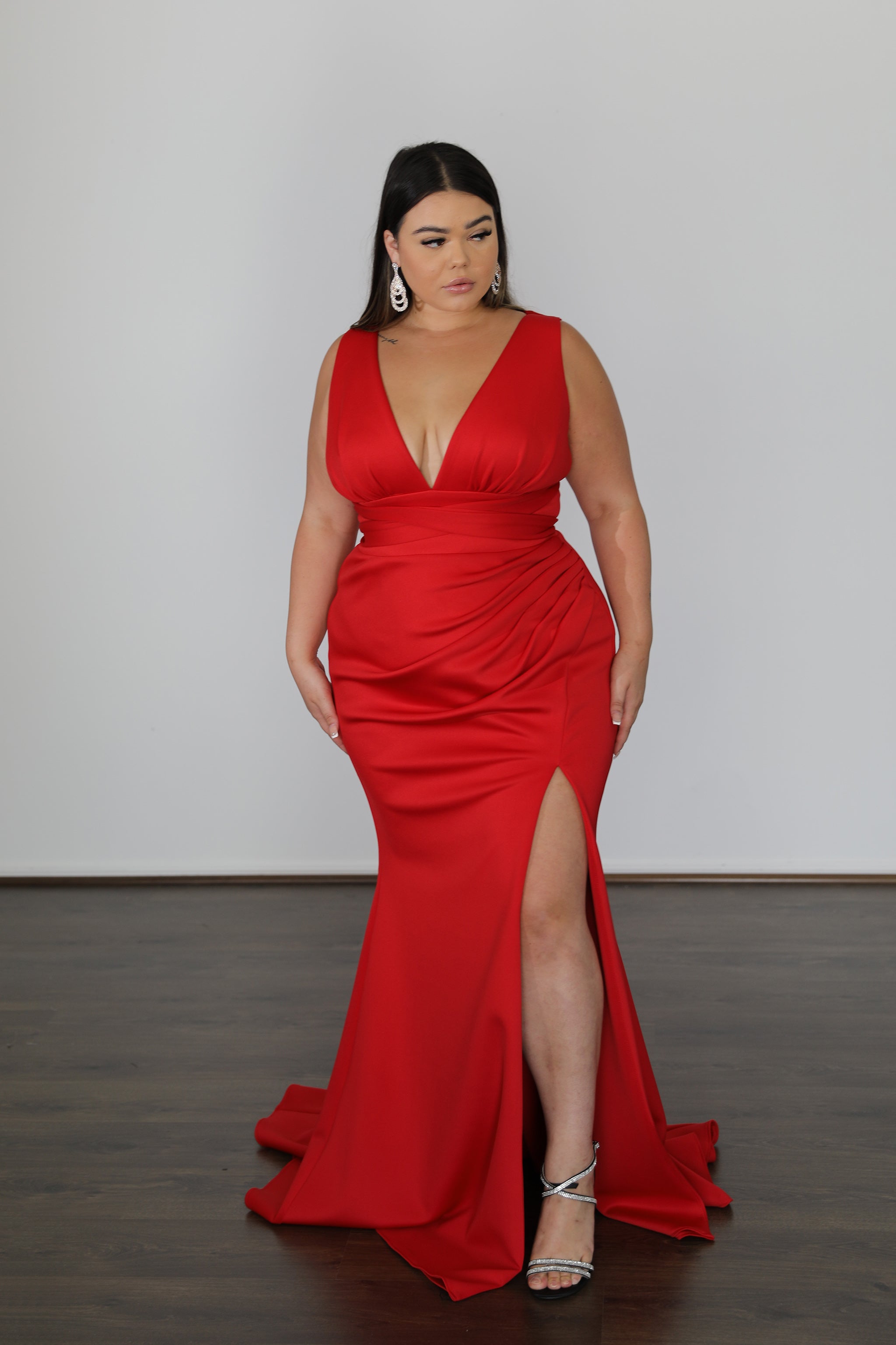 red formal gown on brunette model