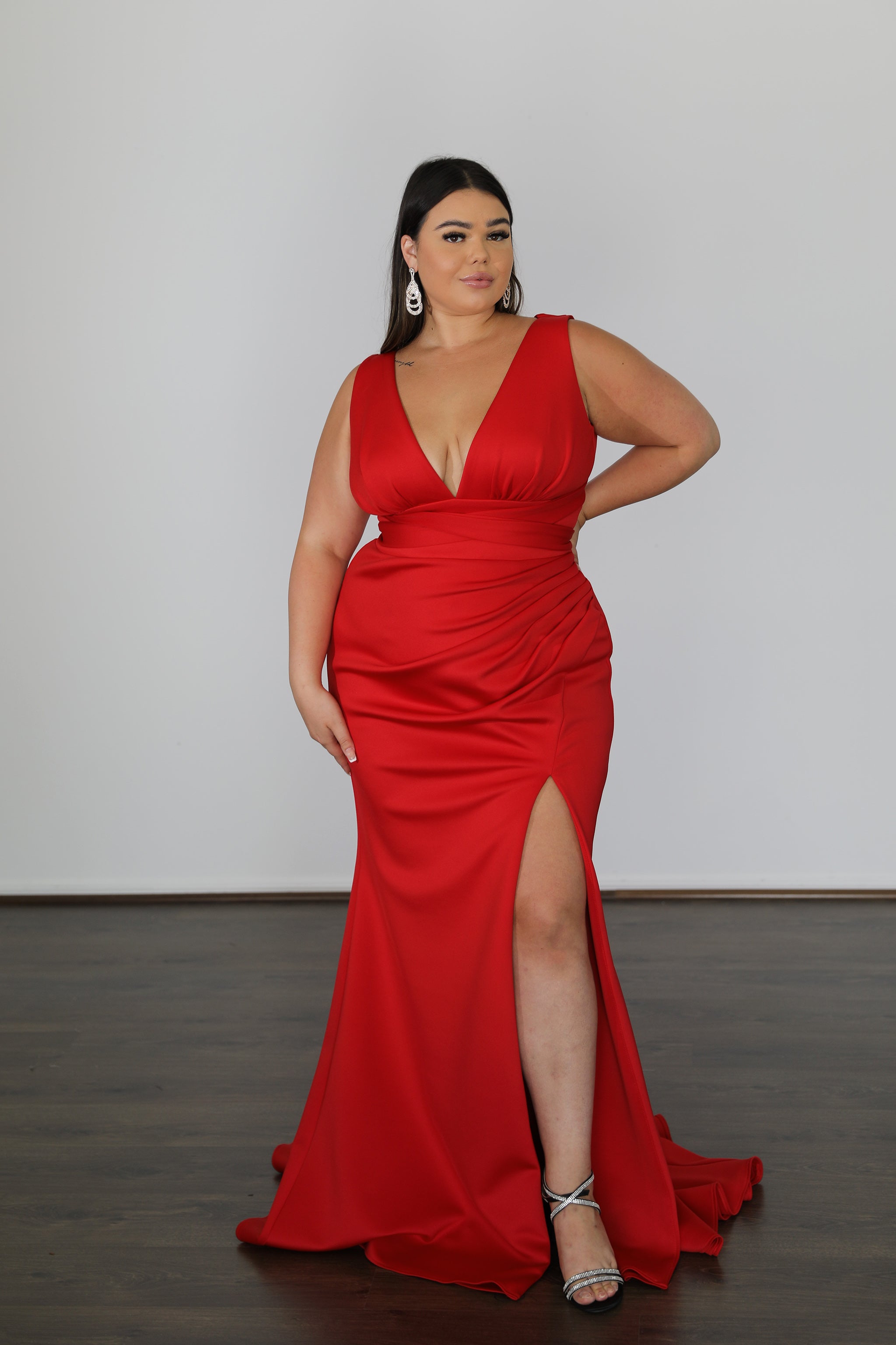 woman in red v-neck formal dress